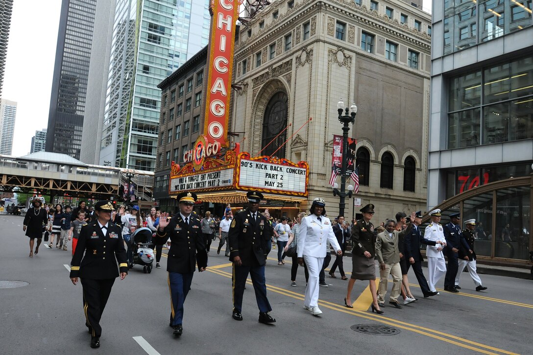 Brig. Gen. Kris Belanger, left, Commanding General, 85th U.S. Army Reserve Support Command; along with her Soldiers, military leaders and City of Chicago Mayor Lori Lightfoot step off in the Chicago Memorial Day parade, Mar. 25, 2019.