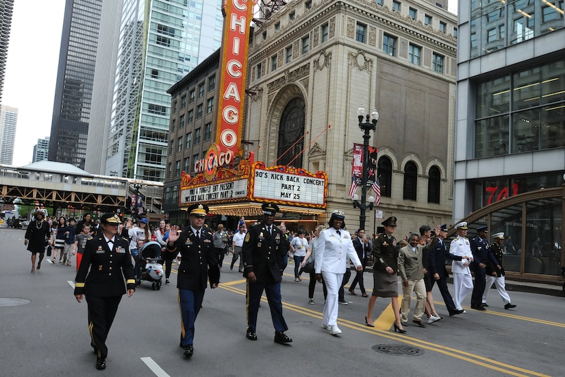 Brig. Gen. Kris Belanger, left, Commanding General, 85th U.S. Army Reserve Support Command; along with her Soldiers, military leaders and City of Chicago Mayor Lori Lightfoot step off in the Chicago Memorial Day parade, Mar. 25, 2019.