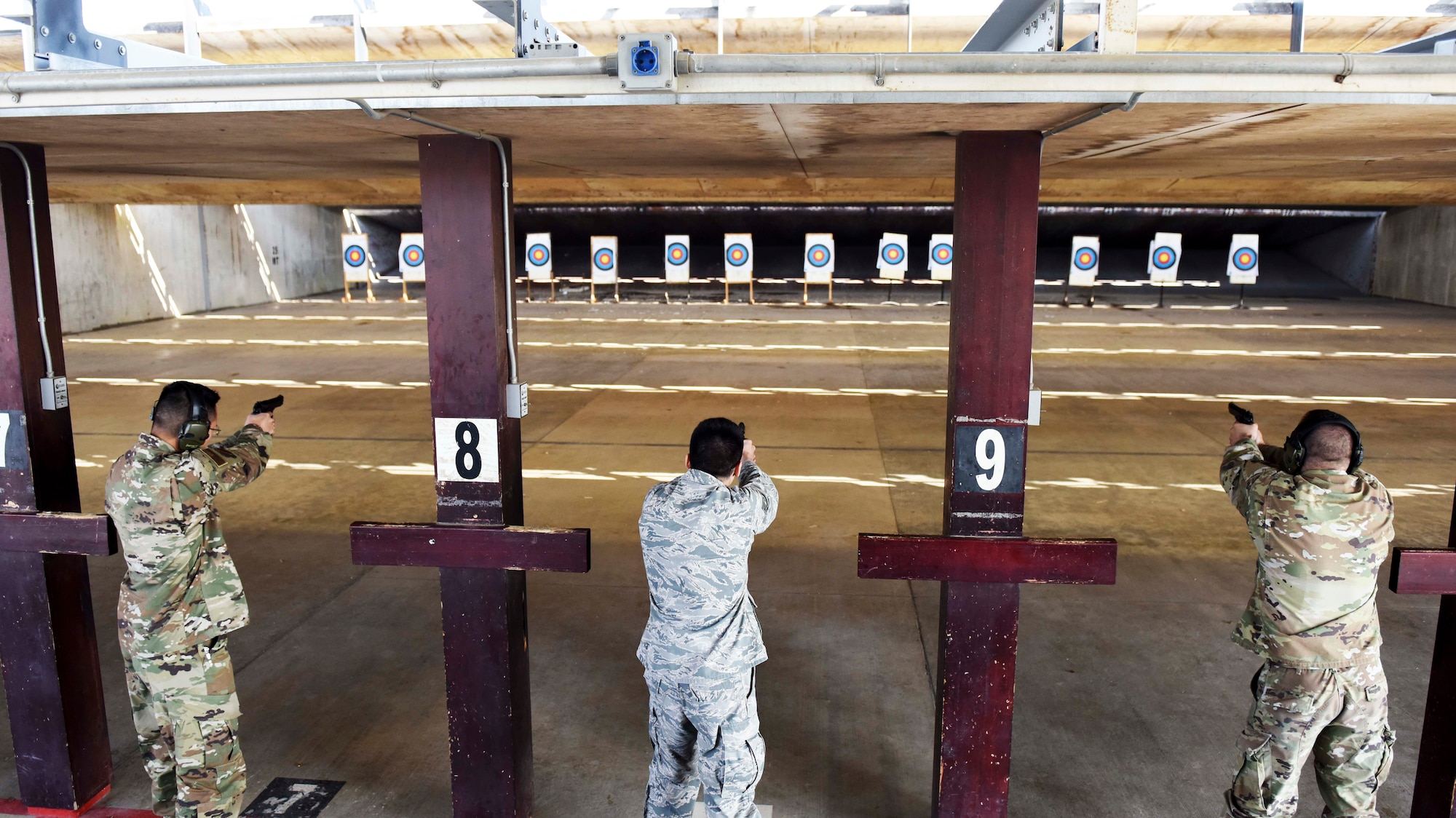 U.S. Air Force Airmen shoot targets during the Excellence in Competition event Oct. 28, 2019, at Incirlik Air Base, Turkey. The 39th Security Forces Squadron hosted the event, in which the top ten contenders win the right to wear the EIC badge on their service dress uniforms. (U.S. Air Force photo by Staff Sgt. Joshua Magbanua)