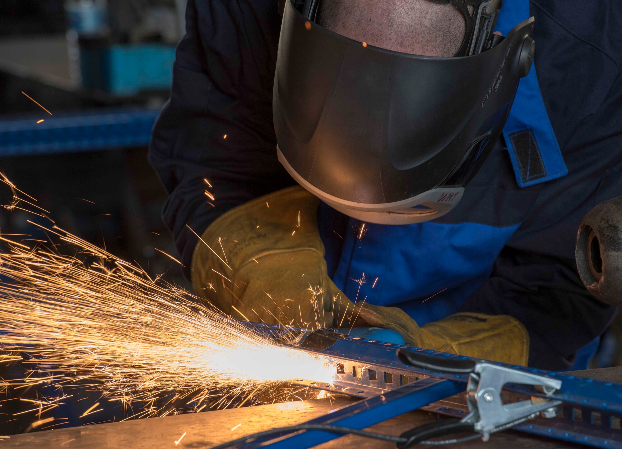 U.S. Air Force Staff Sgt. Jason Barnes, 39th Maintenance Squadron aircraft metals technology technician, uses a plasma cutter to cut excess material a railing, Oct. 25, 2019, at Incirlik Air Base, Turkey. Plasma cutters give technicians a quick, efficient way to cut down parts to fit a customer’s needs. (U.S. Air Force photo by Staff Sgt. Trevor Rhynes)