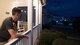 Airman 1st Class Joshua Bruner, 26th Operational Weather Squadron weather forecaster, looks out into his yard at Barksdale Air Force Base, La., Oct 19, 2019. (U.S. Air Force photo by Airman 1st Class Lillian Miller)