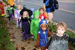 Parade goers in Defense Distribution Center Susquehanna’s annual “Spooktacular” Halloween Parade step off dressed to impress