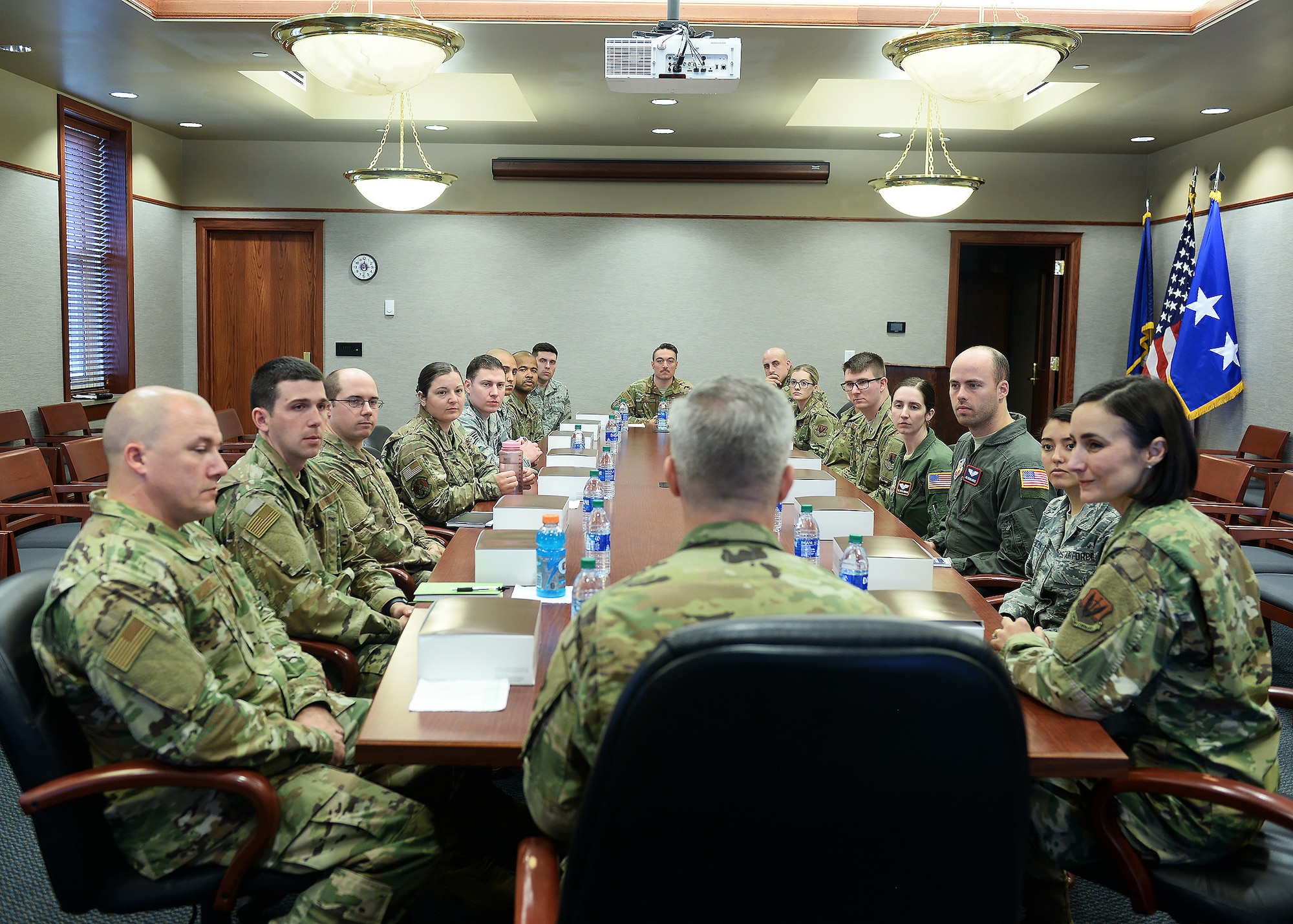 Team Offutt members listens to Lt. Gen. Timothy Haugh, 16th Air Force commander, during a luncheon held inside the 55th Mission Support Group conference room at Offutt Air Force Base, Nebraska.