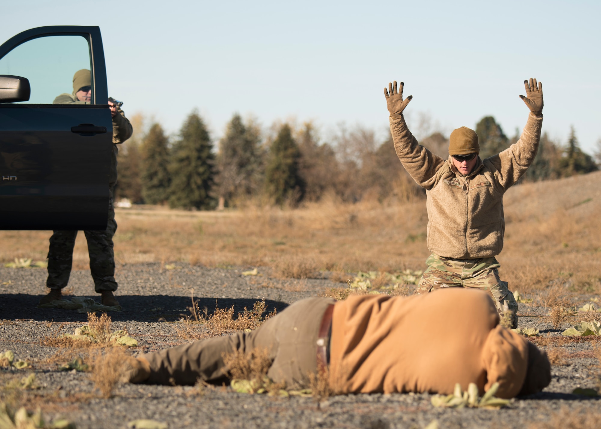 92nd Security Forces Squadron Airmen practice a show of force traffic stop training exercise during a Year of the Defender media day event at Fairchild Air Force Base, Washington, Oct. 29, 2019. The U.S. Air Force’s largest career field consists of more than 38,000 security forces Airmen that work worldwide to protect its people, assets and arsenal. (U.S. Air Force photo by Senior Airman Ryan Lackey)