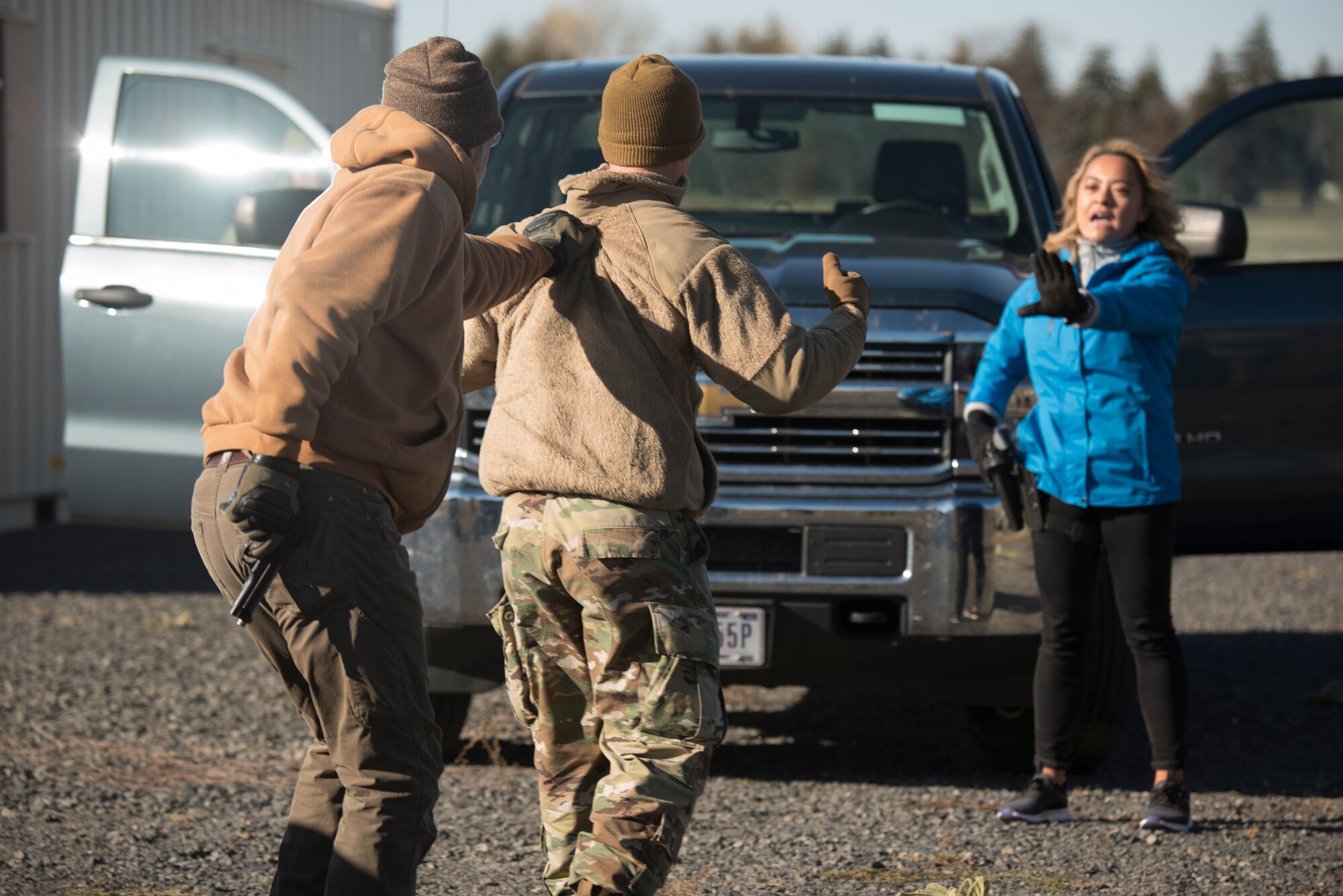 92nd Security Forces Squadron Airmen practice a show of force traffic stop training exercise with Nikki Torres, KXLY reporter, during a Year of the Defender media day event at Fairchild Air Force Base, Washington, Oct. 29, 2019. Show of Force training is vital to help train Defenders on how to think quickly and react with an appropriate amount of force. (U.S. Air Force photo by Senior Airman Ryan Lackey)