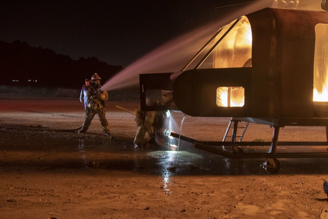 U.S. Army Reserve firefighters cool Autumn flames