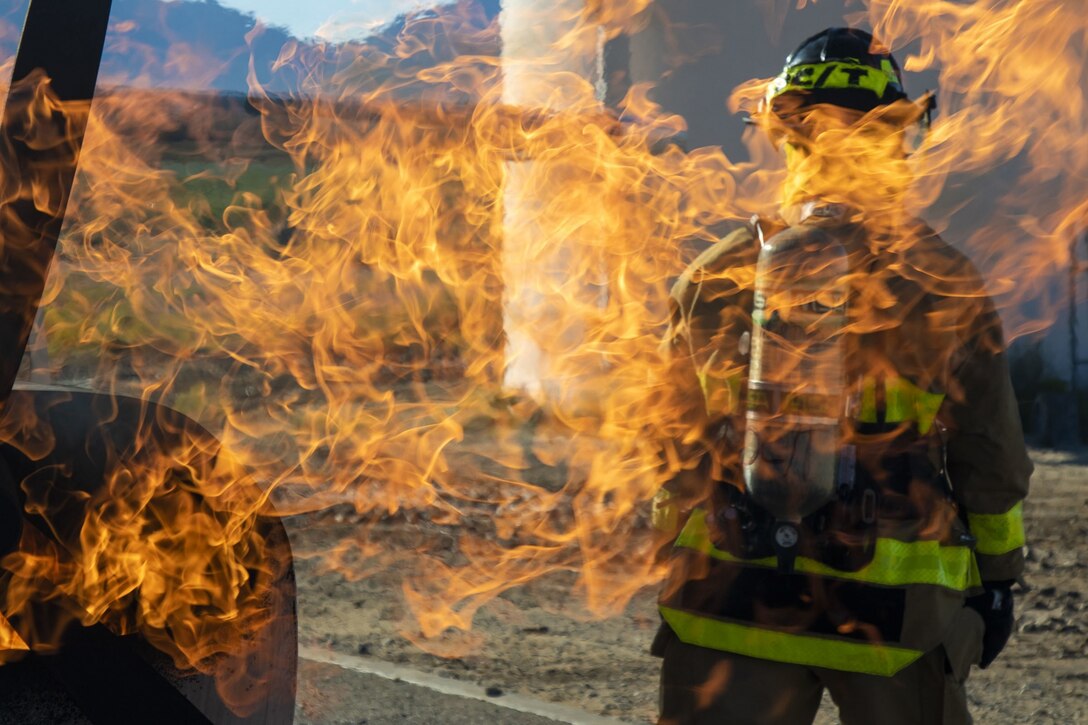 U.S. Army Reserve firefighters cool Autumn flames