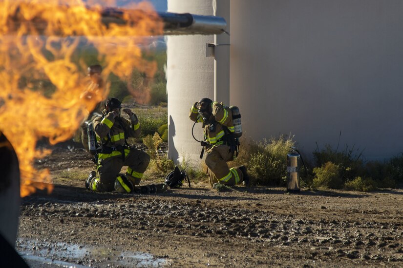 U.S. Army Reserve firefighters cool Autumn flames