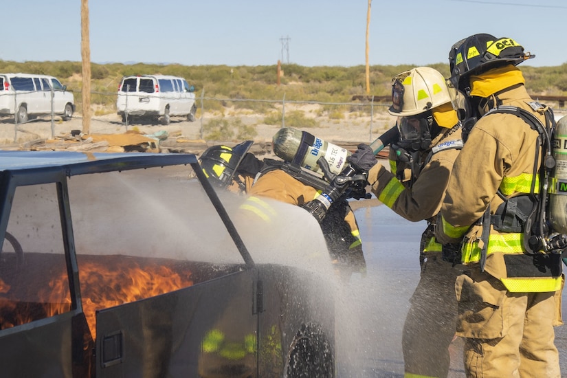 U.S. Army Reserve firefighters cool Autumn flames