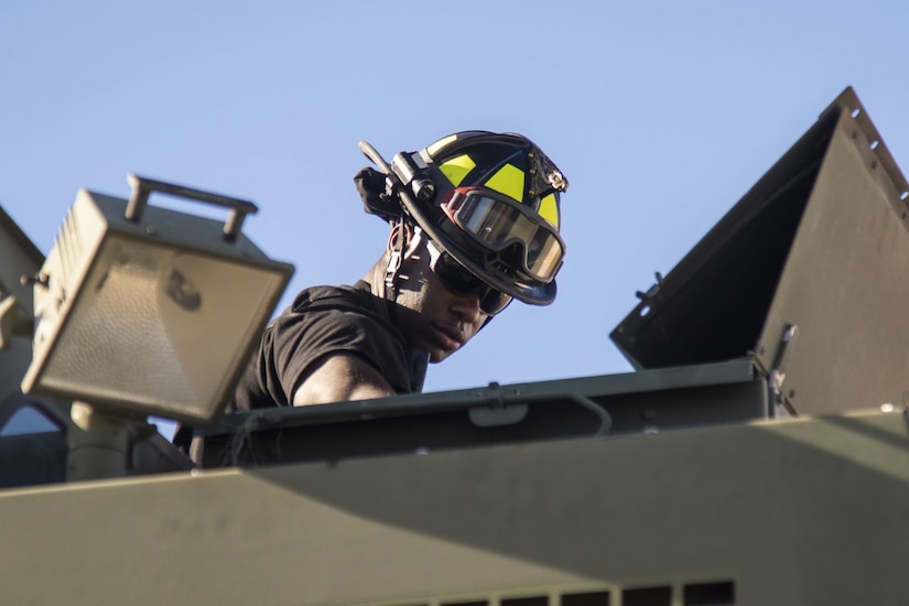 U.S. Army Reserve firefighters cool Autumn flames