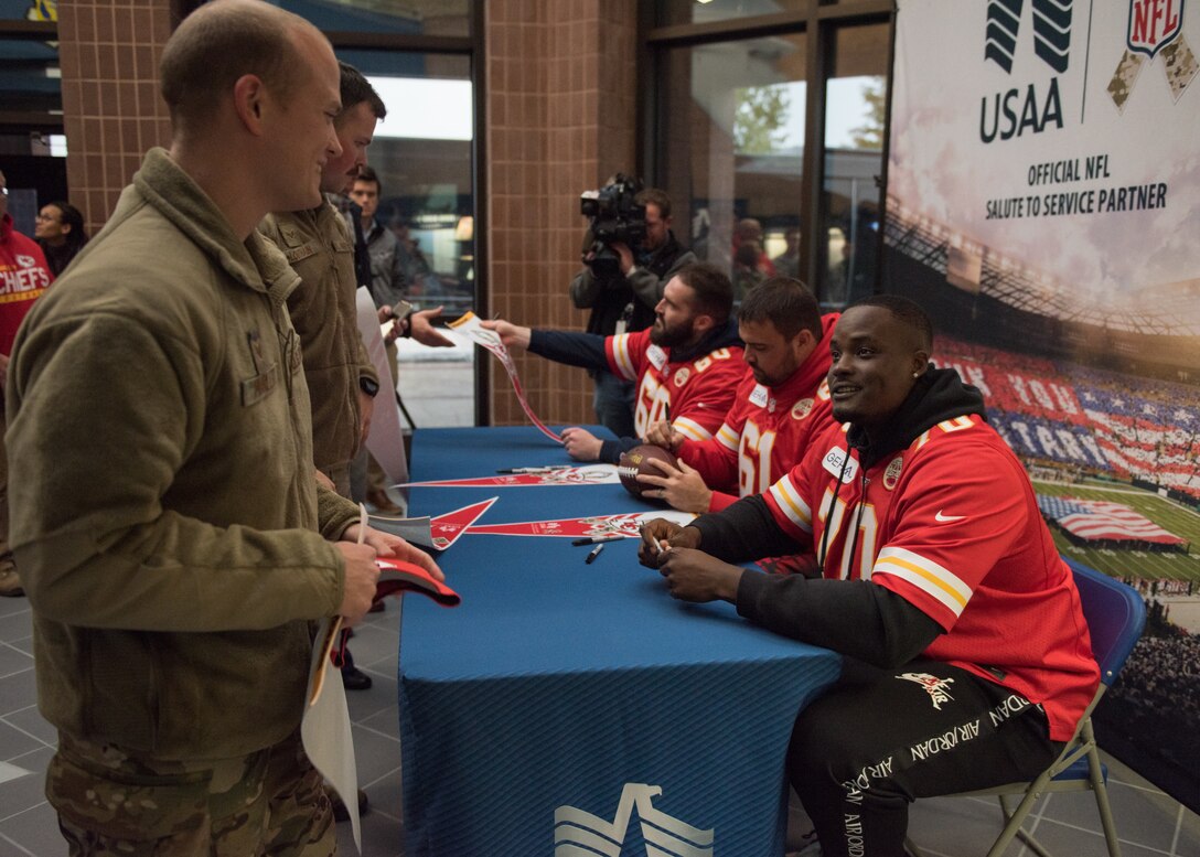 National Football League’s Kansas City Chiefs offensive linemen meet with fans during a visit at Whiteman Air Force Base, Missouri, Oct. 29, 2019.