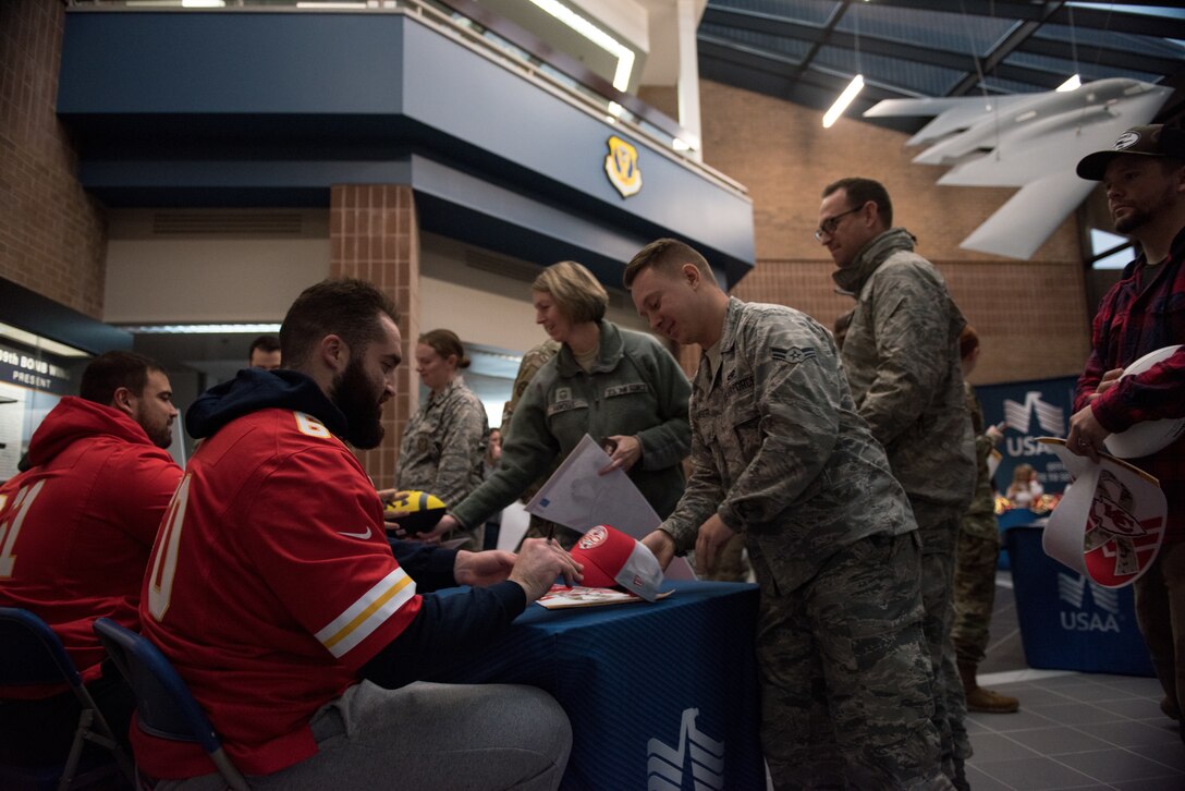 National Football League’s Kansas City Chiefs offensive linemen meet with fans and sign autographs during a visit at Whiteman Air Force Base, Missouri, Oct. 29, 2019.