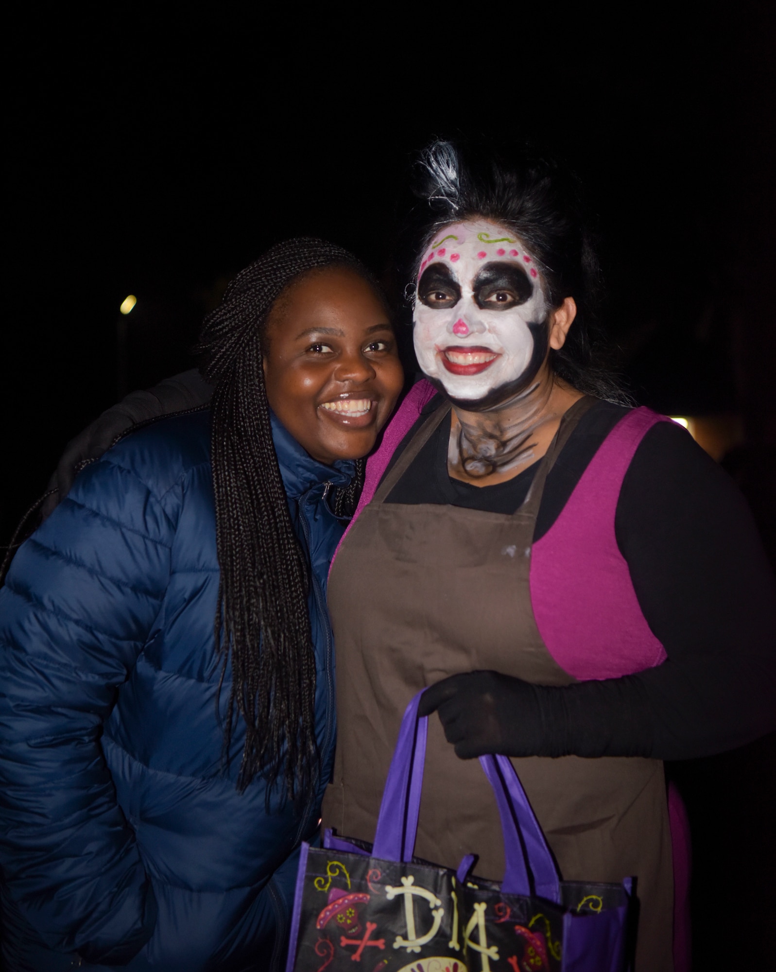 Jackie Adowoa, left, British national, and Connie Gueits, RAF Lakenheath spouse, pose for a photo at the Pumpkin Patrol in Beck Row, England, Oct 31, 2019. This is the first time in several years that the local community has access to the base housing community. (U.S. Air Force photo by Senior Airman Alexandria Lee)