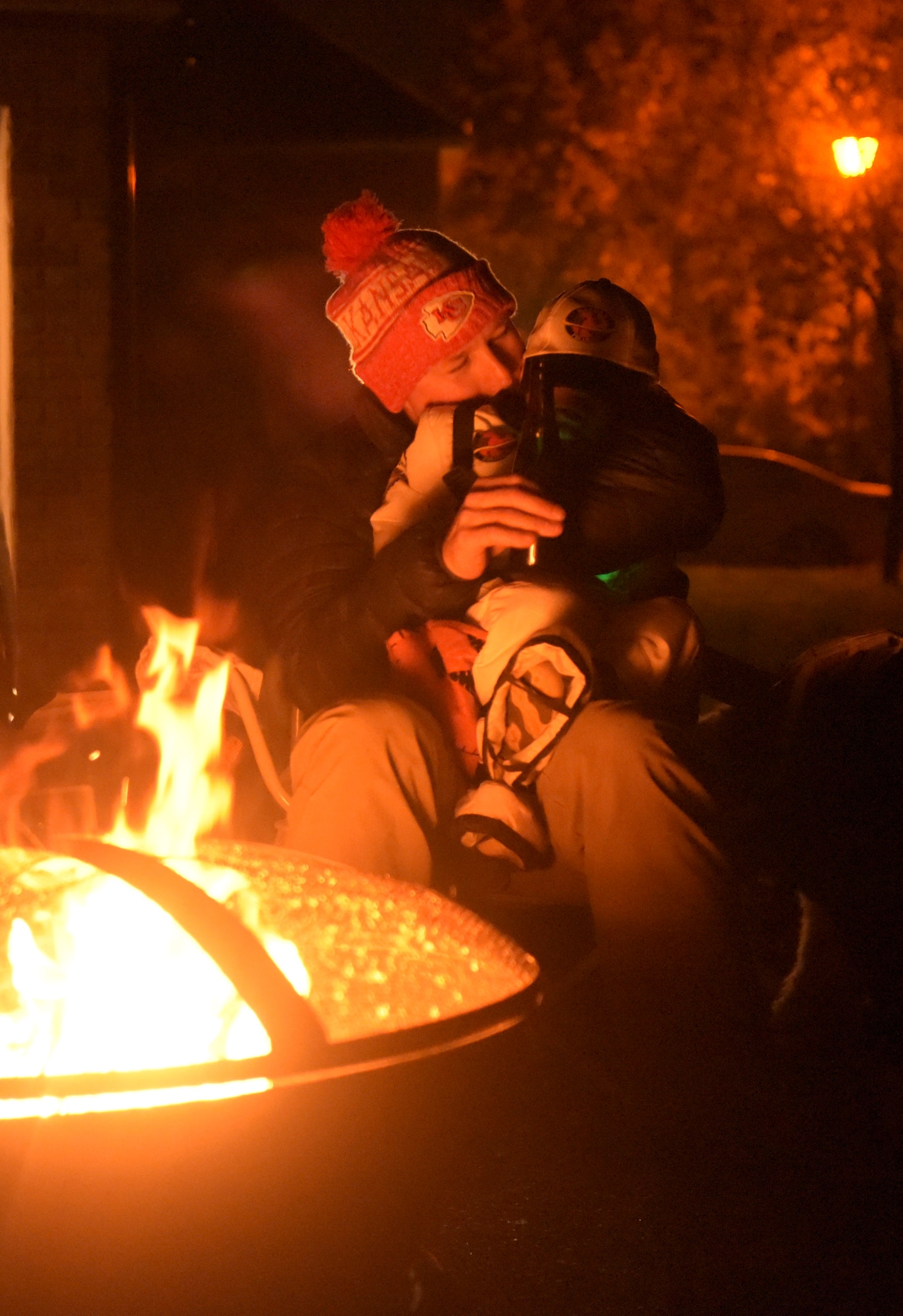 A U.S. Air Force Airman from AF Mildenhall, hugs his son during the Pumpkin Patrol in Beck Row, England, Oct 31, 2019. The Pumpkin Patrol is an event dedicated to the American tradition of trick-or-treating, nearly every house participating in some way. (U.S. Air Force photo by Senior Airman Alexandria Lee)