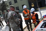 West Virginia National Guard and Peruvian Army experts discuss logistics and natural disaster planning and response in Lima, Peru, Oct. 15-17, 2019. Col. Davis Shafer and Capt. Caroline Muriama, WVNG, learn about search and rescue tools at the multipurpose brigade in Lima.