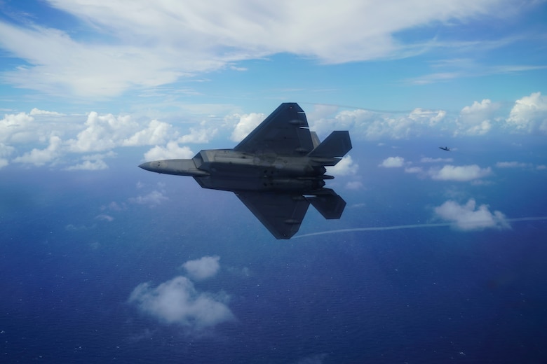 Two F-22 Raptors fly in formation