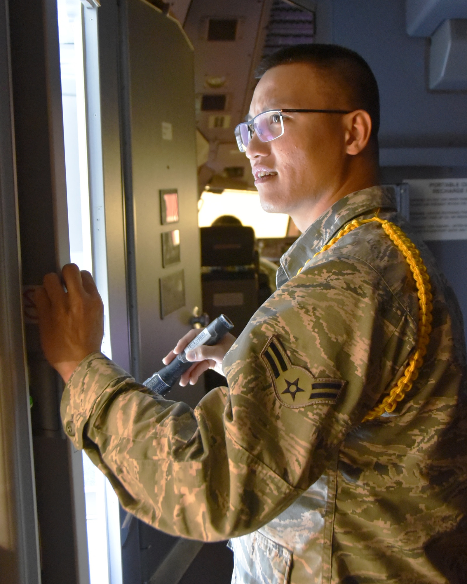 Airman 1st Class Cuong Nguyen, 373rd Training Squadron Detachment 8 Mission Ready Airmen student, practices a pre-flight inspection on the exterior of a KC-46A Pegasus Oct. 29, 2019, at McConnell Air Force Base, Kan.