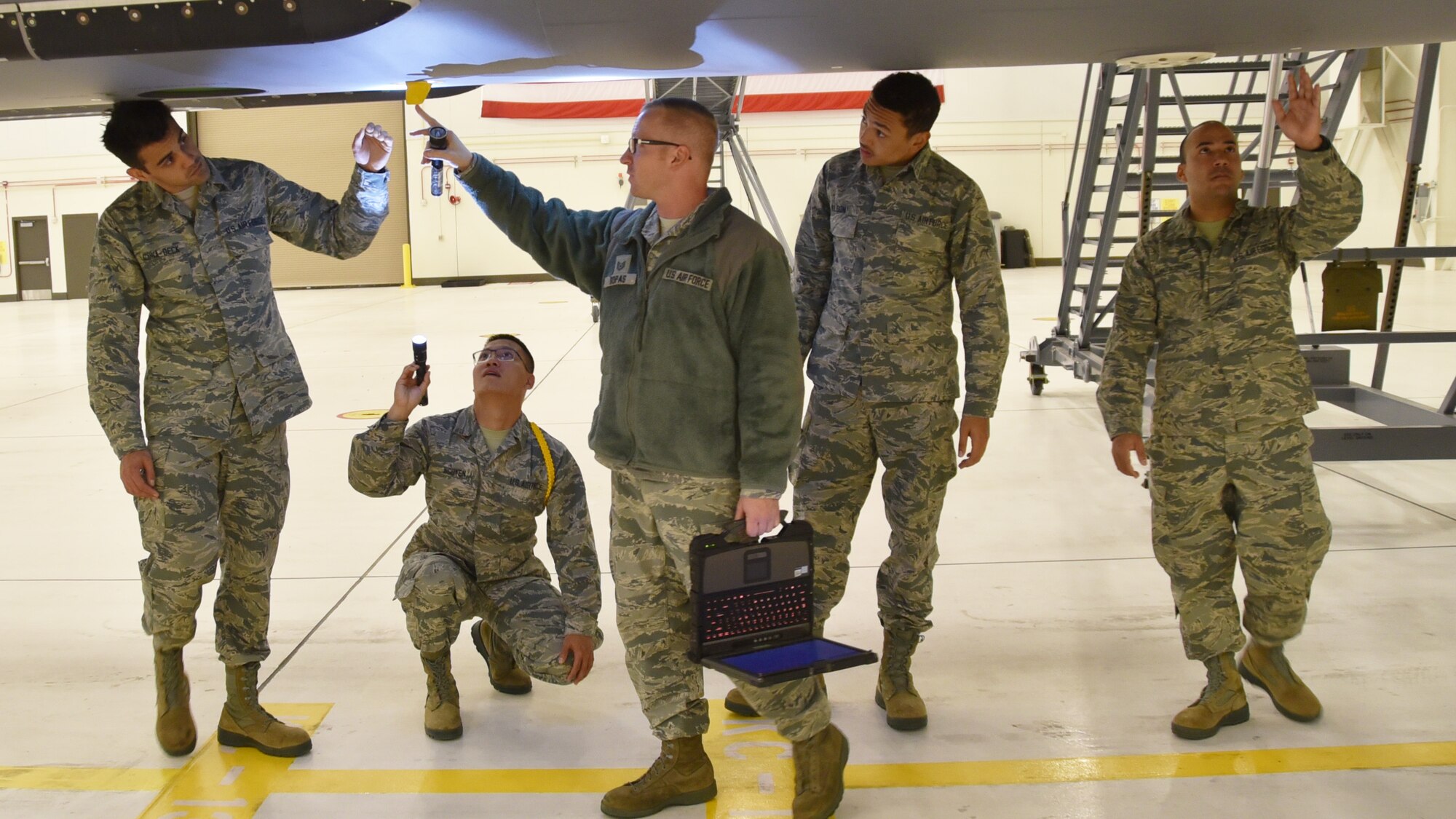 Students from the 373rd Training Squadron Detachment 8 Mission Ready Airmen practice a pre-flight inspection on the exterior of a KC-46A Pegasus Oct. 29, 2019, at McConnell Air Force Base, Kan.