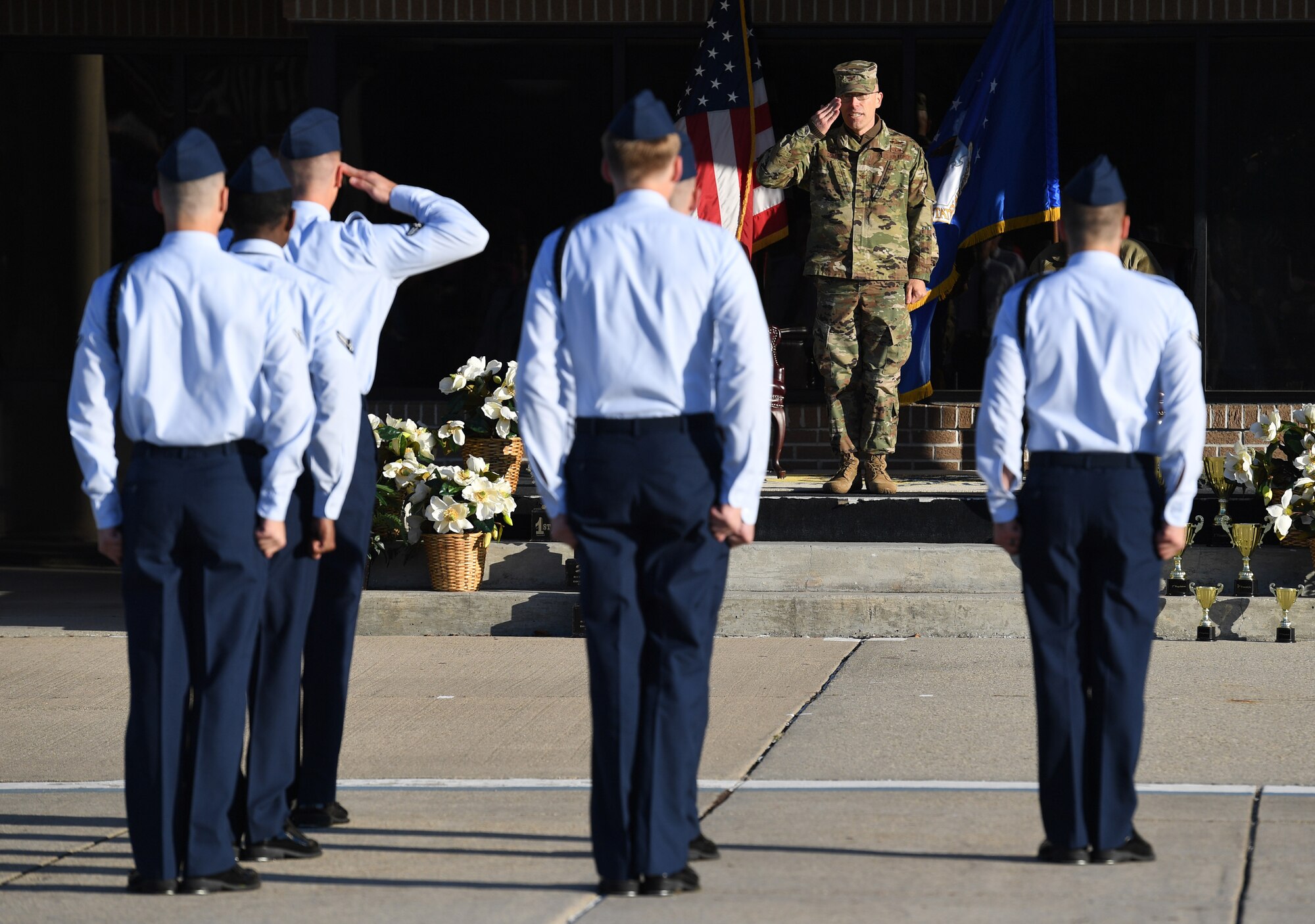 U.S. Air Force Col. Chance Geray, 81st Training Group commander, grants permission to the 334th Training Squadron to enter the field of regulation drill competition during the 81st Training Group drill down on the Levitow Training Support Facility drill pad at Keesler Air Force Base, Mississippi, Nov. 1, 2019. Airmen from the 81st TRG competed in a quarterly open ranks inspection, regulation drill routine and freestyle drill routine. Keesler trains more than 30,000 students each year. While in training, Airmen are given the opportunity to volunteer to learn and execute drill down routines. (U.S. Air Force photo by Kemberly Groue)