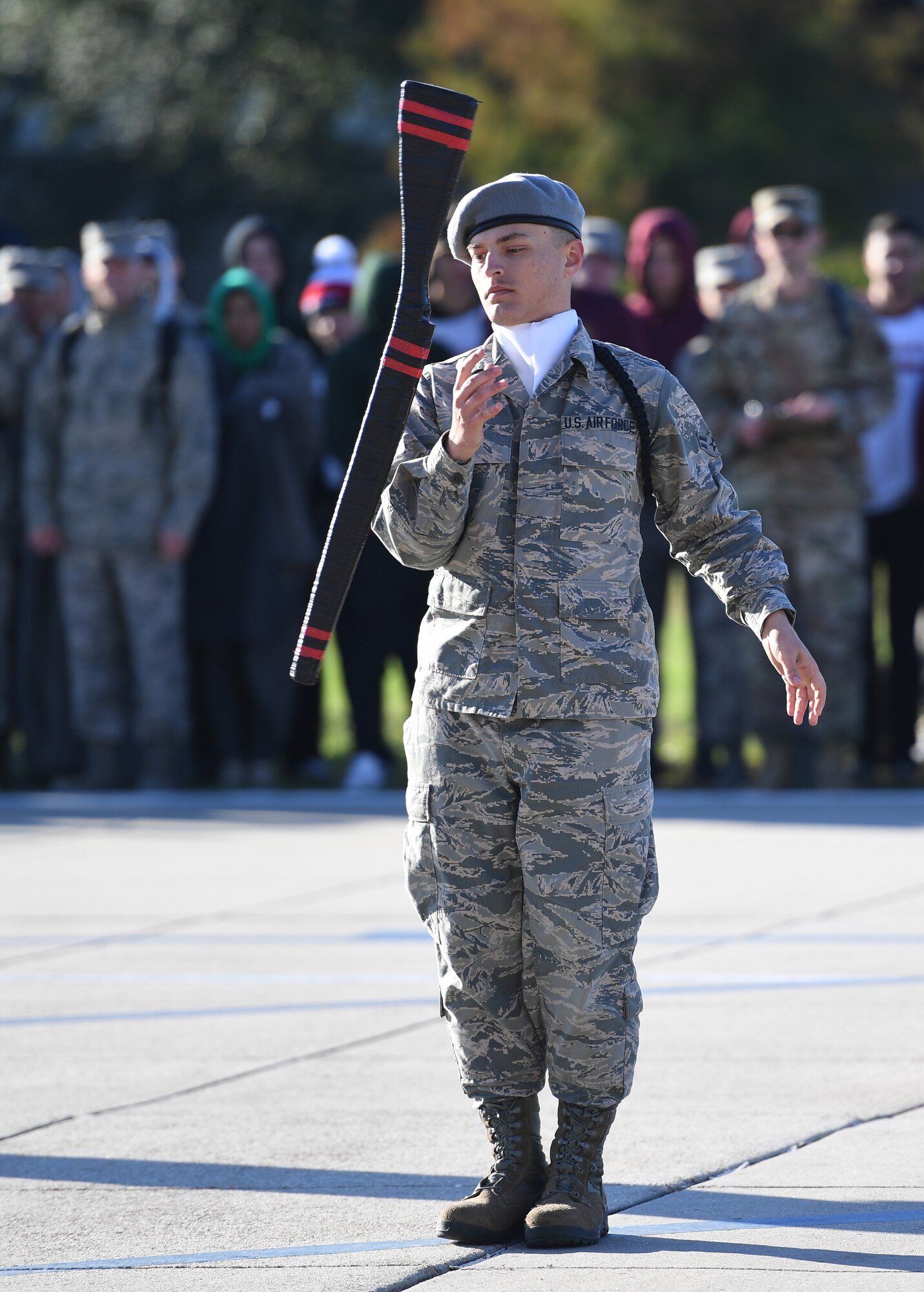 U.S. Air Force Airman 1st Class Ethan Muncy, 335th Training Squadron freestyle drill master, performs during the 81st Training Group drill down on the Levitow Training Support Facility drill pad at Keesler Air Force Base, Mississippi, Nov. 1, 2019. Airmen from the 81st TRG competed in a quarterly open ranks inspection, regulation drill routine and freestyle drill routine. Keesler trains more than 30,000 students each year. While in training, Airmen are given the opportunity to volunteer to learn and execute drill down routines. (U.S. Air Force photo by Kemberly Groue)