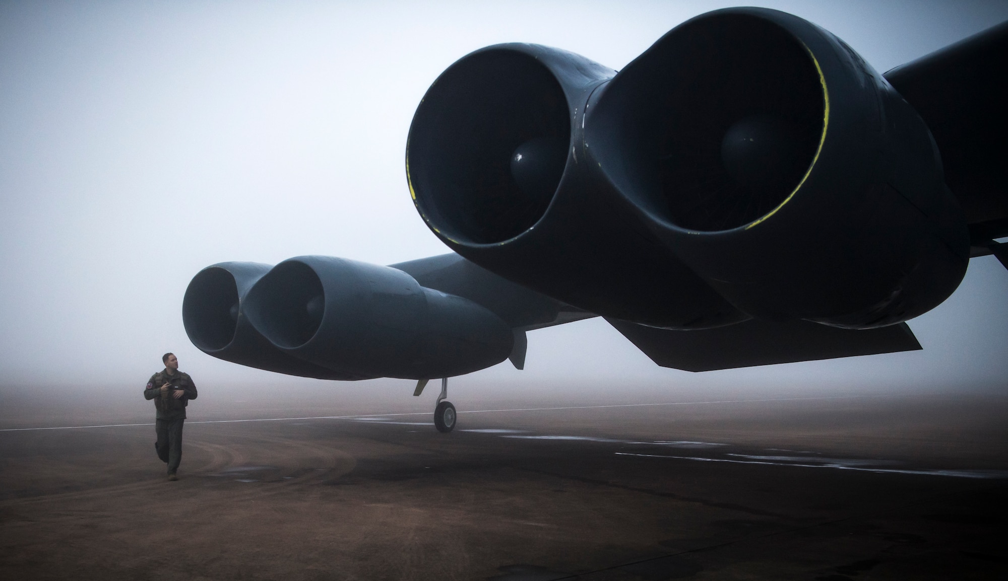 A pilot does a preflight inspection on a B-52H Stratofortress