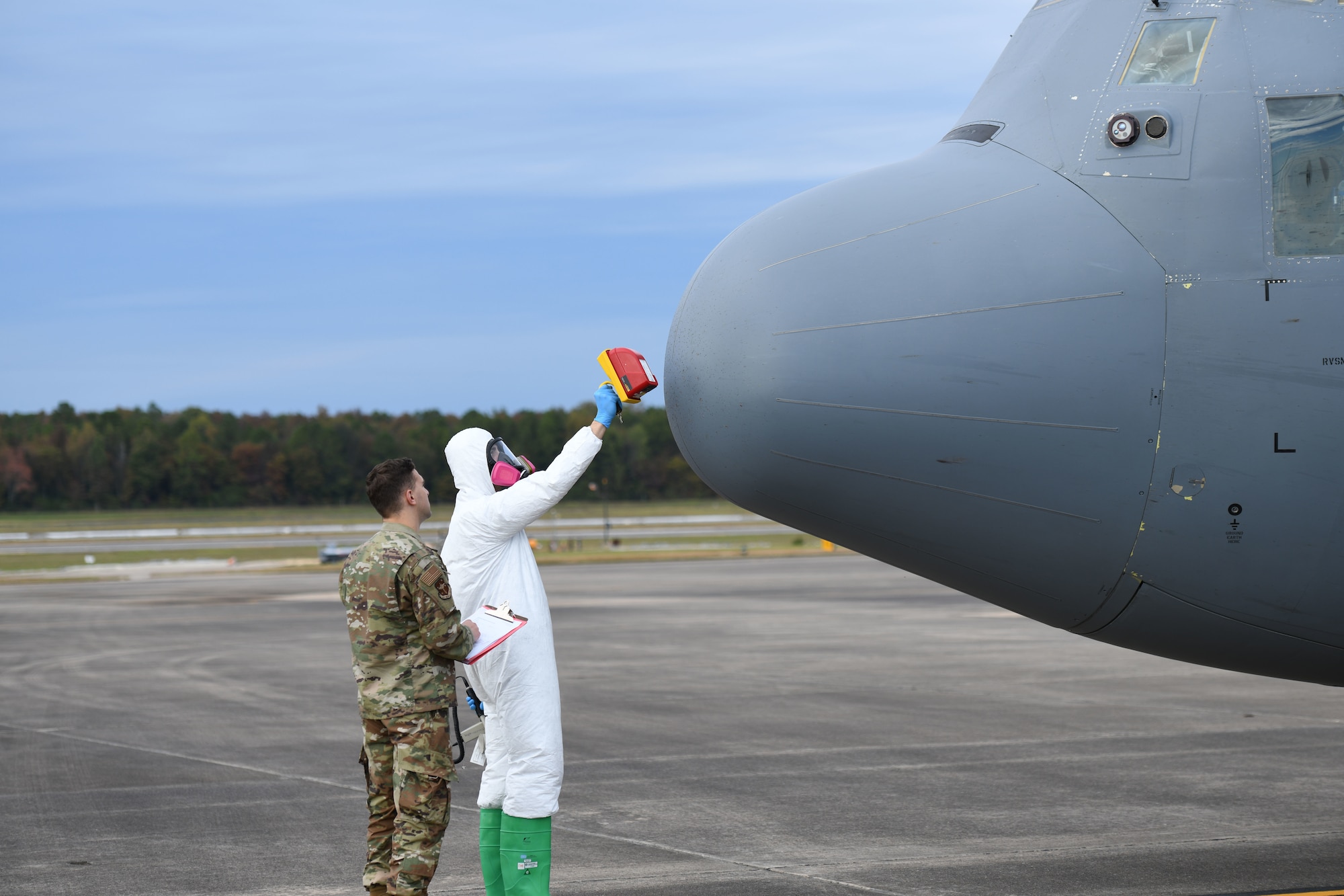 a man inspects an aircraft