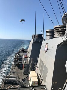 The Navy's Towed Airborne Lift of Naval Systems (TALONS) flies behind the Arleigh Burke-class guided-missile destroyer USS Porter (DDG 78) during NATO Exercise Recognised Environmental Picture by Maritime Unmanned Systems 2019 in the Atlantic Ocean Sept. 14, 2019. (U.S. Navy photo by Eric Silberg/Released)
