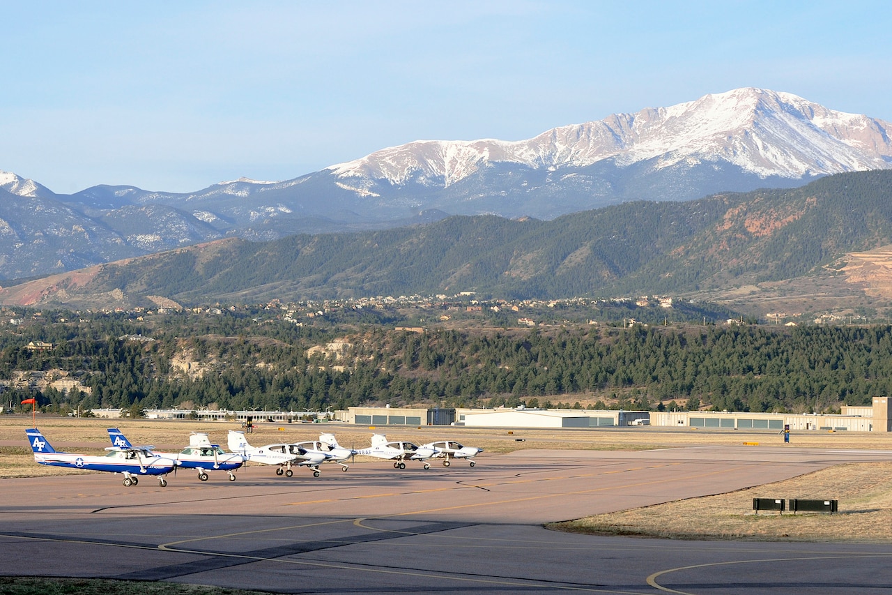 Aircraft line up on a flight line.