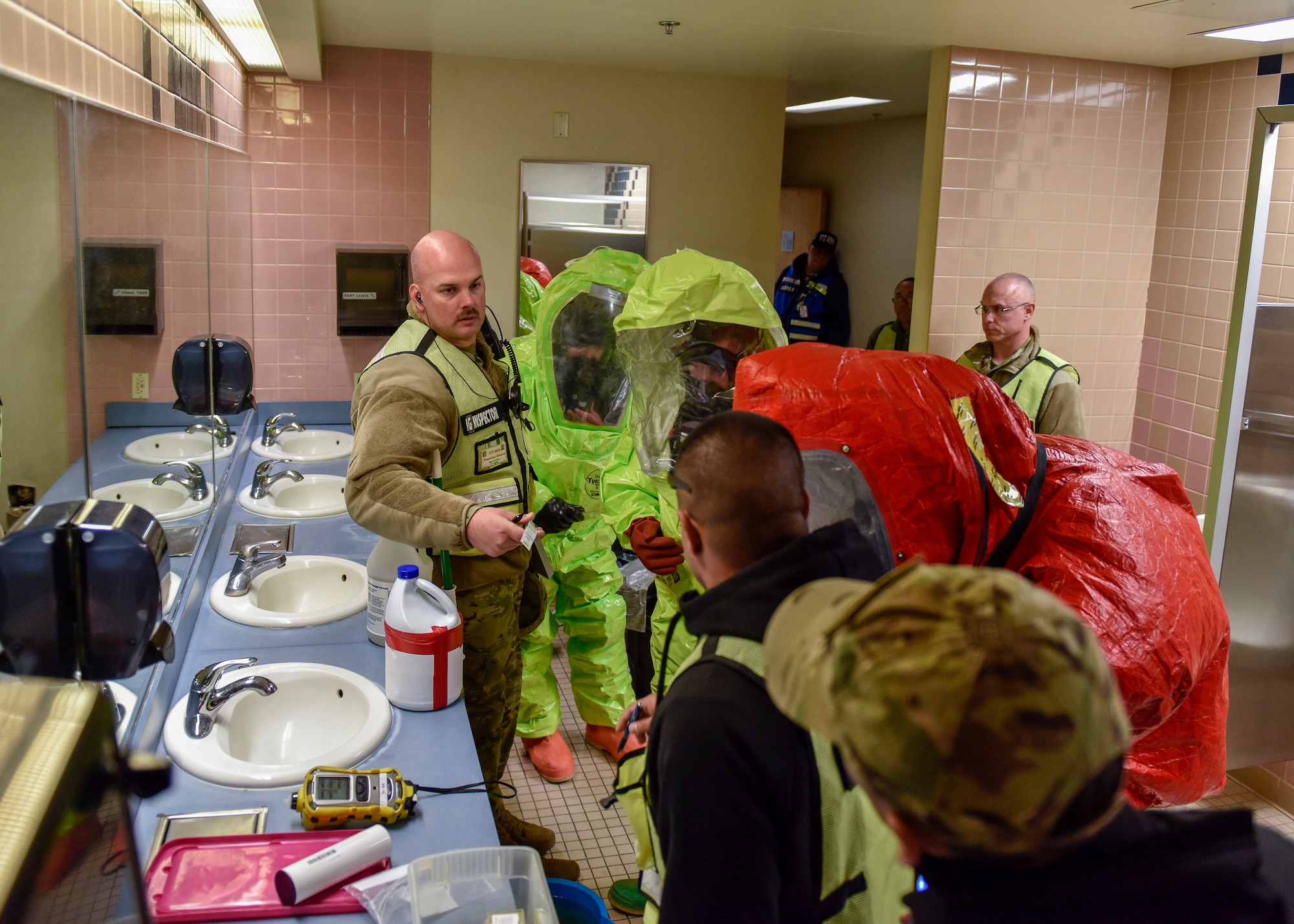 Participants and inspectors in exercise Global Thunder 20 clarify chemical findings during a simulated chemical, biological, radiological and nuclear emergency at Kirtland Air Force Base, N.M., Oct. 24, 2019. Global Thunder is a U.S. Strategic Command exercise designed to ensure an efficient mission response by testing Airmen's ability to execute command, control and operational procedures during a notional scenario. (U.S. Air Force photo by Airman 1st Class Austin J. Prisbrey)