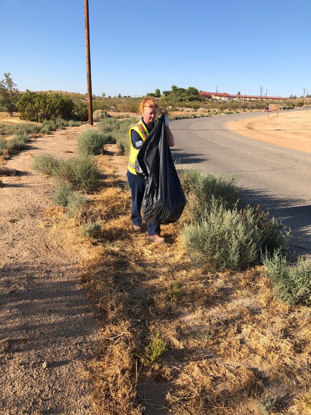 A member of 412th Civil Engineer Squadron participates in the Adopt-A-Lot Program on Edwards Air Force Base, California. (U.S. Air Force photo courtesy of Lee Manning, 412th CES)