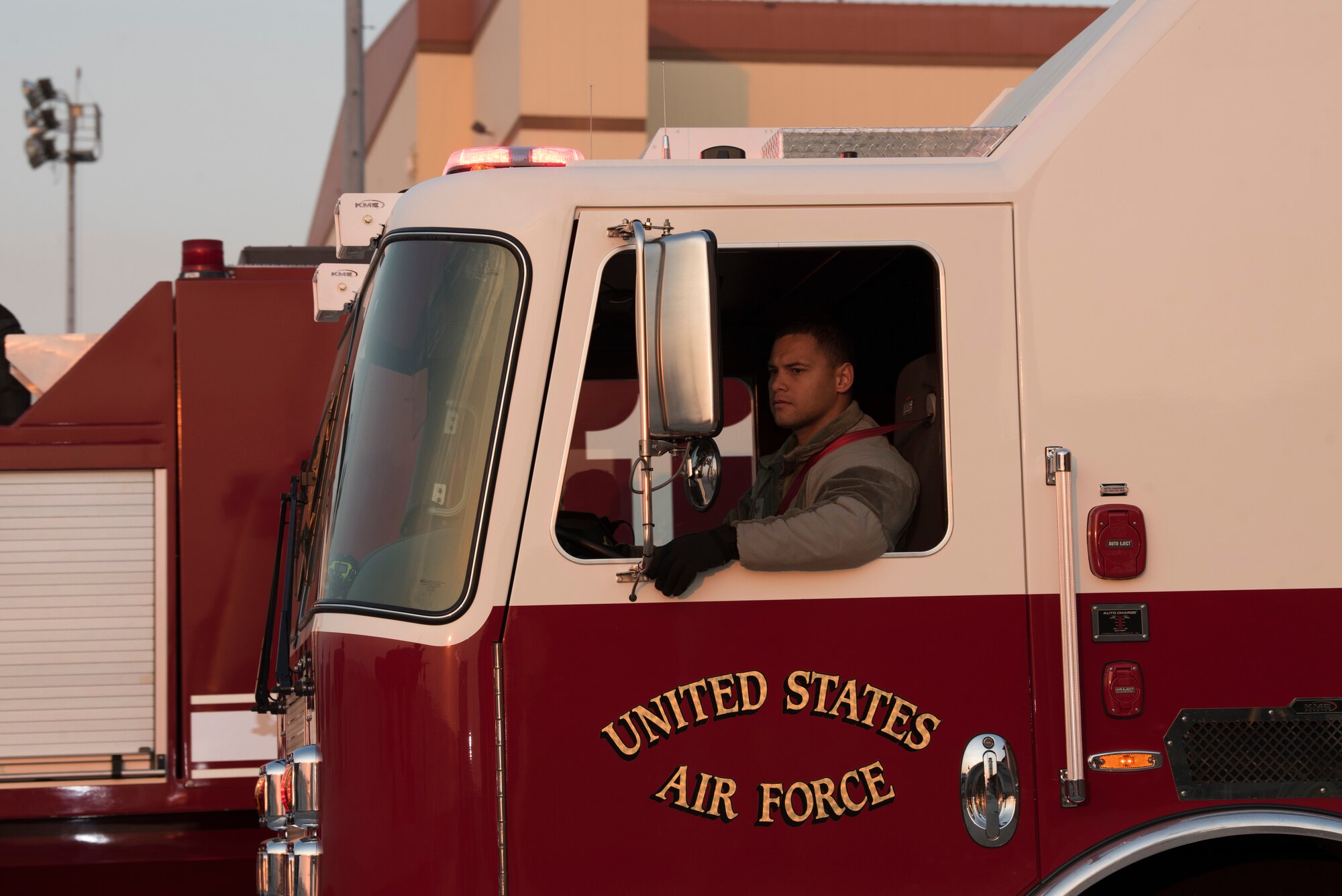 Senior Airman Juner Tenorio, 60th Civil Engineer Squadron Fire and Emergency Services flight driver operator, performs an operational check on a firetruck Oct. 29, 2019, at Travis Air Force Base, California. With the start of every shift, the FES flight conducts inspections on more than 1,000 items including vehicles, protective equipment and hardware.  (U.S. Air Force photo by Tech. Sgt. James Hodgman)
