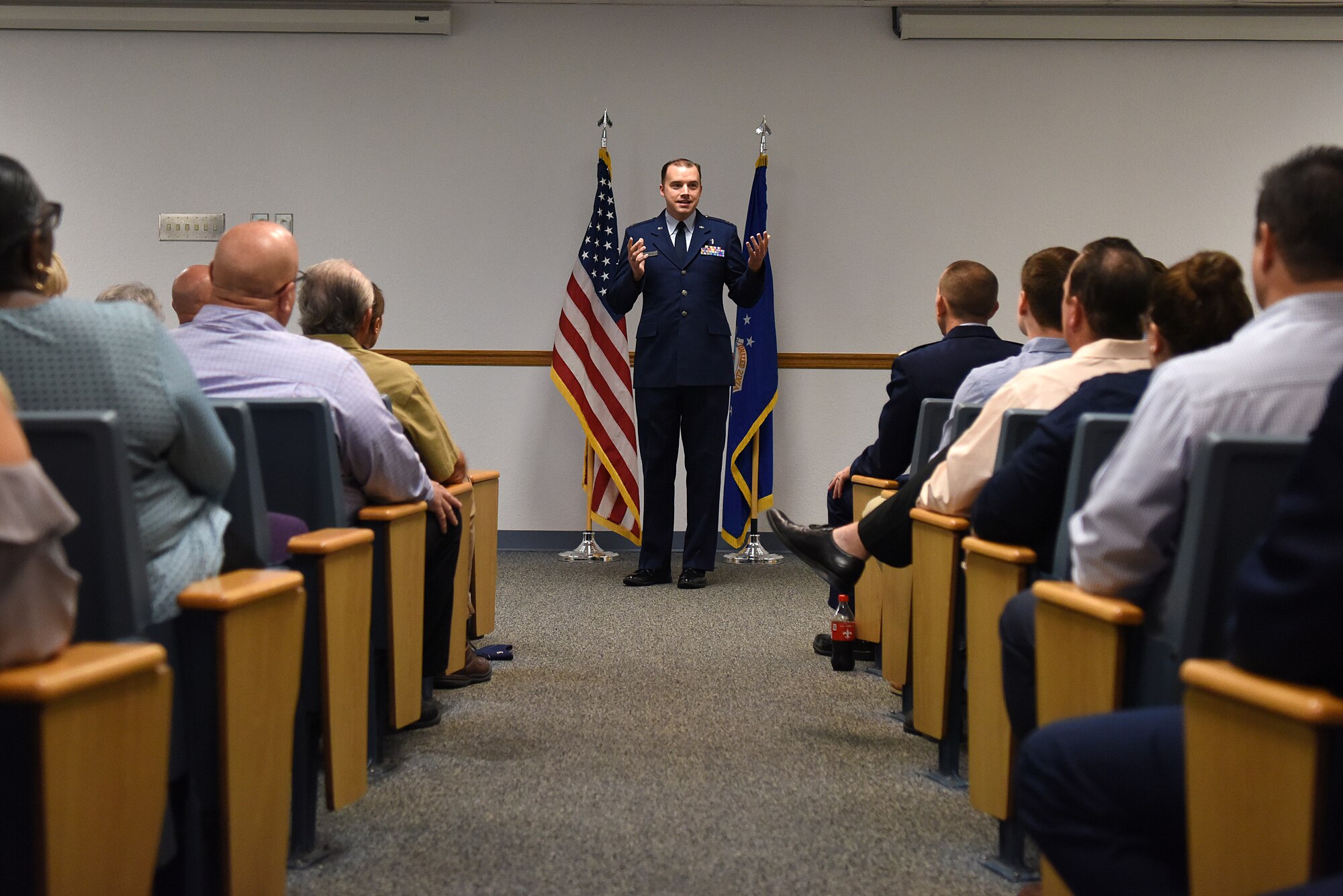 U.S. Air Force Chaplain (Capt.) John Reutemann, 81st Training Wing chaplain, gives remarks during the Sablich Center Auditorium room dedication ceremony for George Budz inside the Sablich Center at Keesler Air Force Base, Mississippi, Oct. 31, 2019. The auditorium has been renamed after Budz who passed away Aug. 3, 2018. Budz served as the 81st Contracting Squadron commander, the 81st Mission Support Group deputy commander and worked nine years in civil service after he retired as a lieutenant colonel. (U.S. Air Force photo by Senior Airman Suzie Plotnikov)