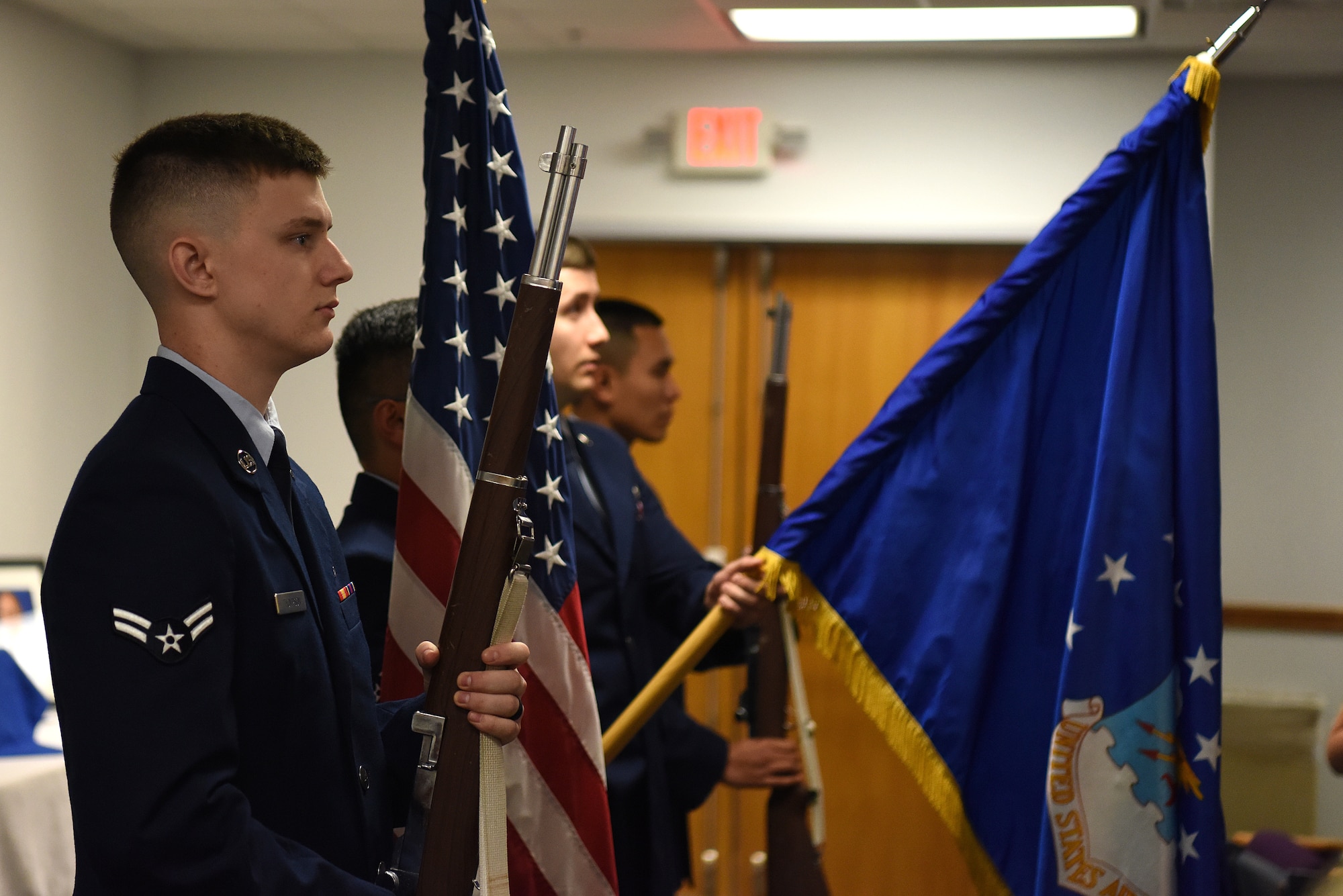 The 81st Contracting Squadron color guard presents the colors during the Sablich Center Auditorium room dedication ceremony for George Budz inside the Sablich Center at Keesler Air Force Base, Mississippi, Oct. 31, 2019. The auditorium has been renamed after Budz who passed away Aug. 3, 2018. Budz served as the 81st CONS commander, the 81st Mission Support Group deputy commander and worked nine years in civil service after he retired as a lieutenant colonel. (U.S. Air Force photo by Senior Airman Suzie Plotnikov)