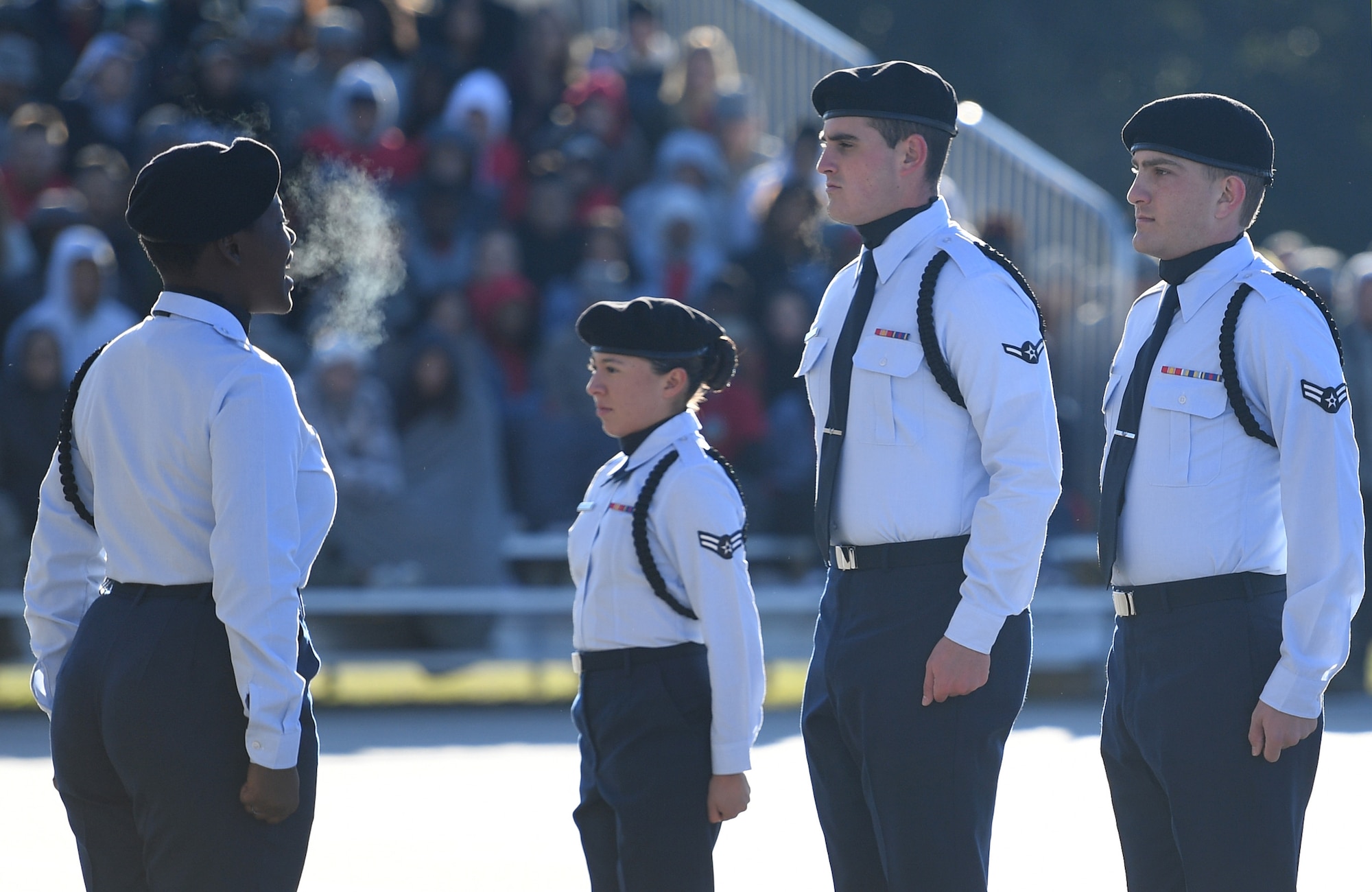 Members of the 338th Training Squadron regulation drill team perform during the 81st Training Group drill down on the Levitow Training Support Facility drill pad at Keesler Air Force Base, Mississippi, Nov. 1, 2019. Airmen from the 81st TRG competed in a quarterly open ranks inspection, regulation drill routine and freestyle drill routine. Keesler trains more than 30,000 students each year. While in training, Airmen are given the opportunity to volunteer to learn and execute drill down routines. (U.S. Air Force photo by Kemberly Groue)