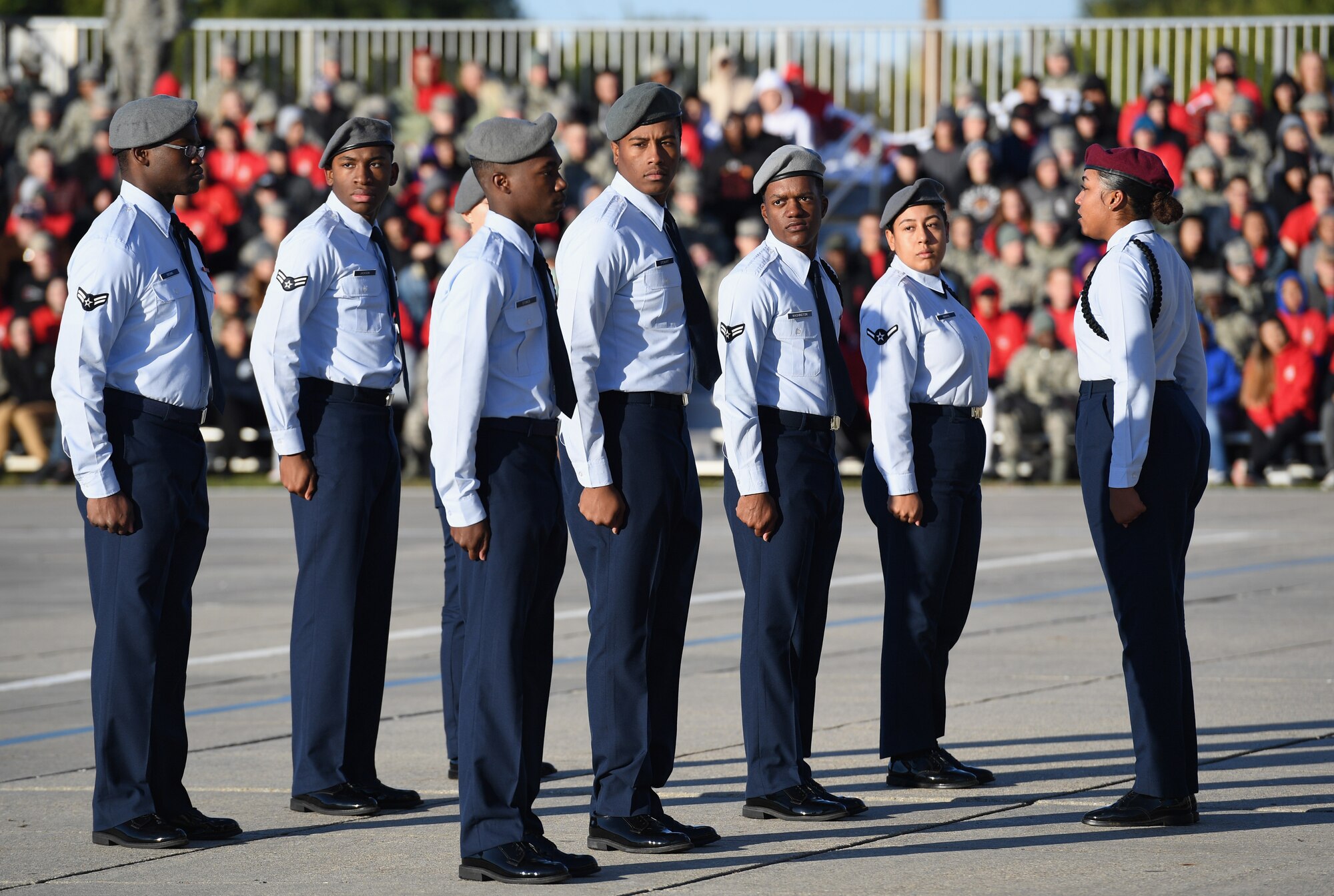 Members of the 335th Training Squadron regulation drill team perform during the 81st Training Group drill down on the Levitow Training Support Facility drill pad at Keesler Air Force Base, Mississippi, Nov. 1, 2019. Airmen from the 81st TRG competed in a quarterly open ranks inspection, regulation drill routine and freestyle drill routine. Keesler trains more than 30,000 students each year. While in training, Airmen are given the opportunity to volunteer to learn and execute drill down routines. (U.S. Air Force photo by Kemberly Groue)