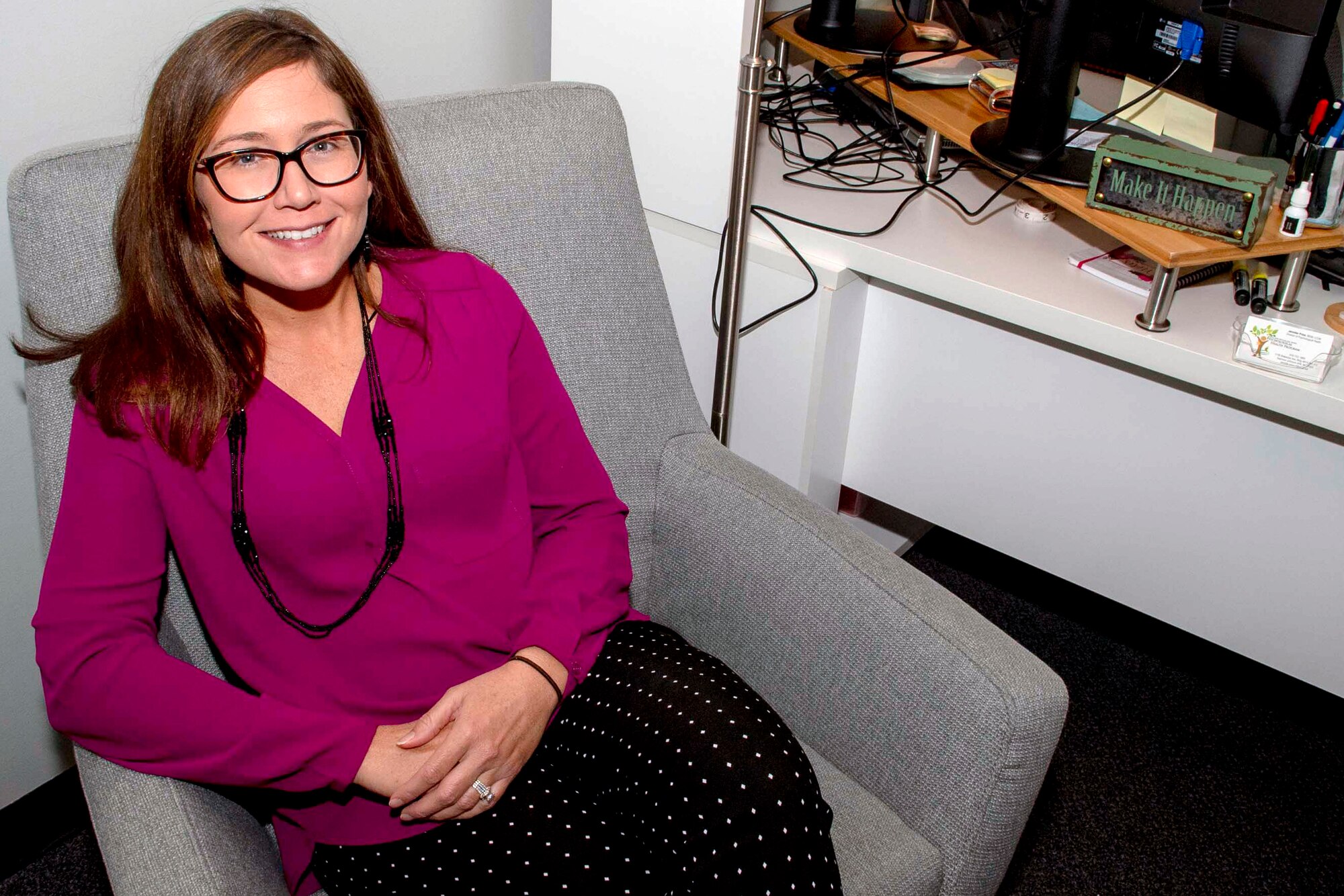 Jennifer S. Price, 916th Air Refuling Wing director of psychological health, poses for a photo in her office