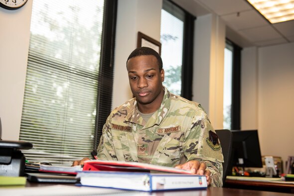 U.S. Air Force Staff Sgt. Darius Willingham, 20th Comptroller Squadron commander’s support staff, reviews physical fitness (PT) standards during work at Shaw Air Force Base, South Carolina, Oct. 30, 2019.