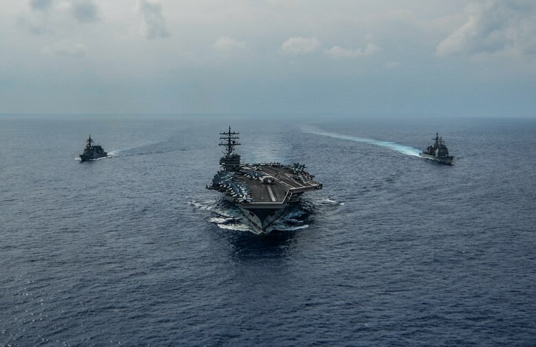 191027-N-KP021-0898 PHILIPPINE SEA (Oct. 27, 2019) The aircraft carrier USS Ronald Reagan (CVN 76), the Ticonderoga class guided-missile cruiser USS Chancellorsville (CG 62) and the Akizuki-class destroyer JS Fuyuzuki (DD 118) from the Japan Maritime Self Defense Force sail in formation while conducting a bilateral exercise. Ronald Reagan and Chancellorsville and forward-deployed to the U.S. 7th Fleet area of operations in support of security and stability in the Indo-Pacific region.