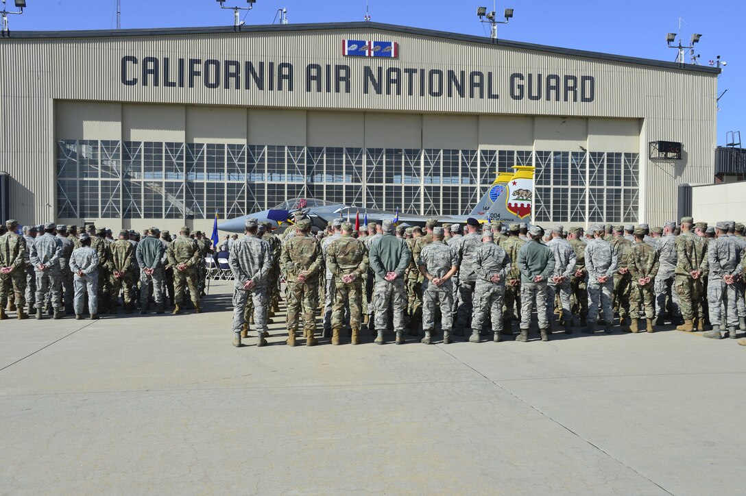 Airmen from the 144th Fighter Wing stand in formation prior to the Assumption of Command ceremony for Col. Jeremiah Cruz, the new wing commander, at the Fresno Air National Guard Base Oct. 2, 2019. (Air National Guard photo by Master Sgt. Charles Vaughn)