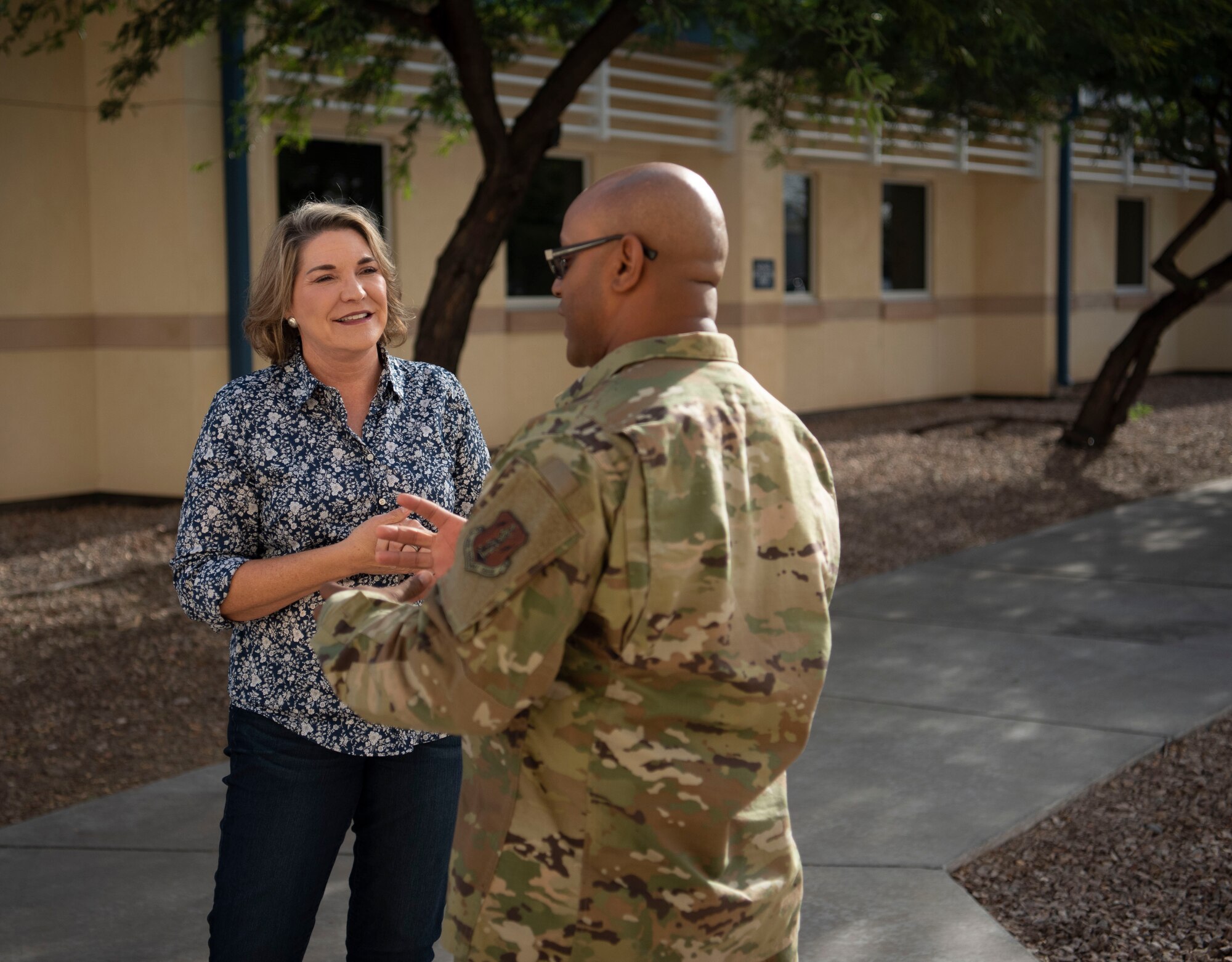 Darci Thompson, the 162nd Wing's Director of Psychological Health, takes a moment to speak with an Airman during drill at Morris Air National Guard Base in Tucson, Ariz.
