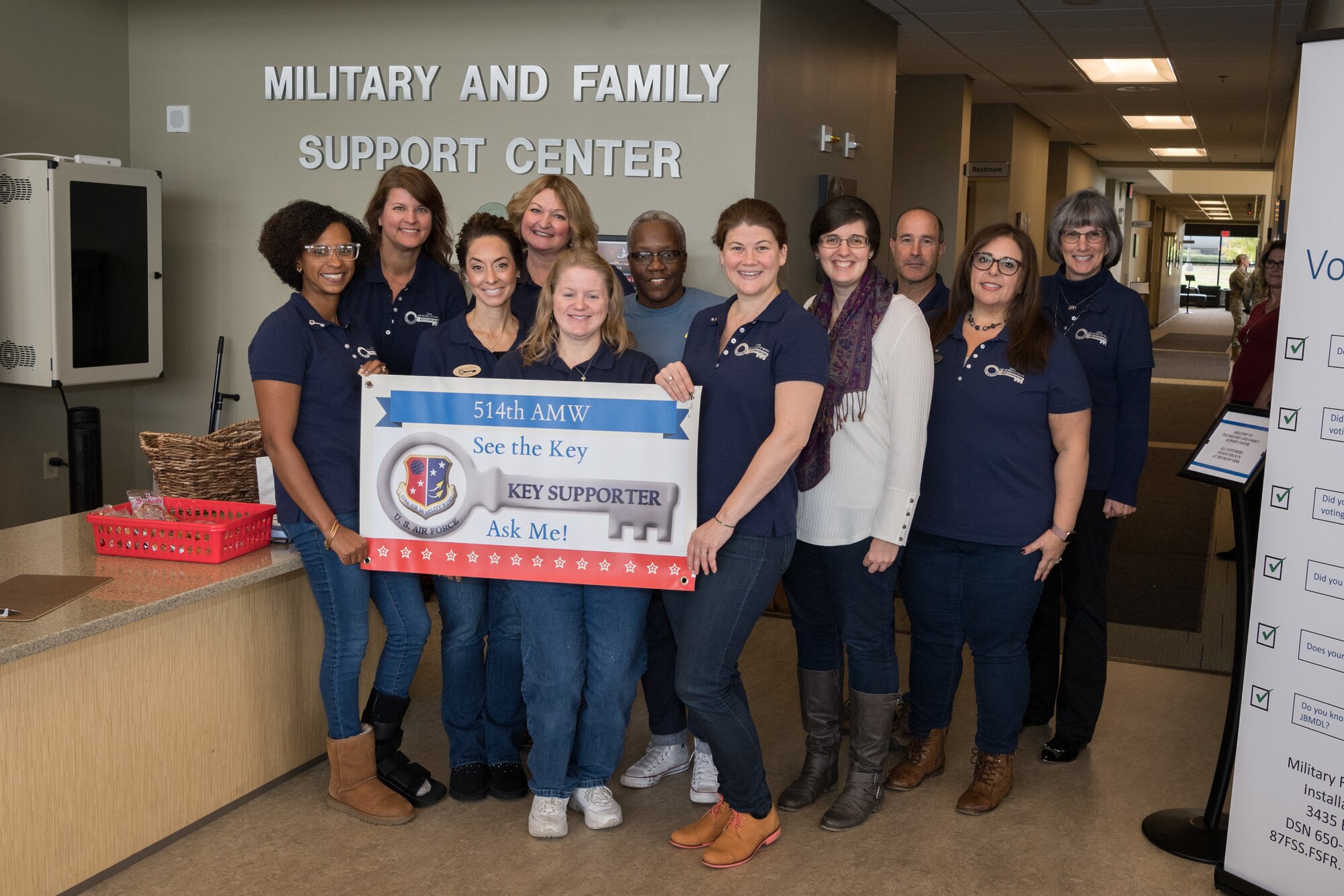 Key Spouses of the 514th Air Mobility Wing, Joint Base McGuire-Dix-Lakehurst, N.J. pose for a photo at the Military and Family Support Center, here, Nov. 2, 2019. The U.S. Air Force Key Spouse Program is an official Air Force Unit Family Readiness Program designed to enhance readiness, personal/family resiliency and establish a sense of Air Force community. The goal of the KSP is to have a cadre of trained volunteers who can support your military families in an official capacity. (U.S. Air Force photo by Senior Airman Ruben Rios)