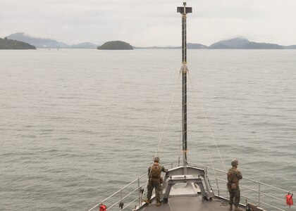 PHUKET, Thailand (Nov. 3, 2019) Marines, from 2nd Battalion, 2nd Marine Regiment, currently assigned to 3rd Marine Division, stand watch on the forecastle, as the Whidbey Island-class dock landing ship USS Germantown (LSD 42) prepares to anchor near Phuket, Thailand.  Germantown, part of Commander, Amphibious Squadron 11, is deployed to the Indo-Pacific region to enhance interoperability with partners and serve as a ready-response force for any type of contingency.