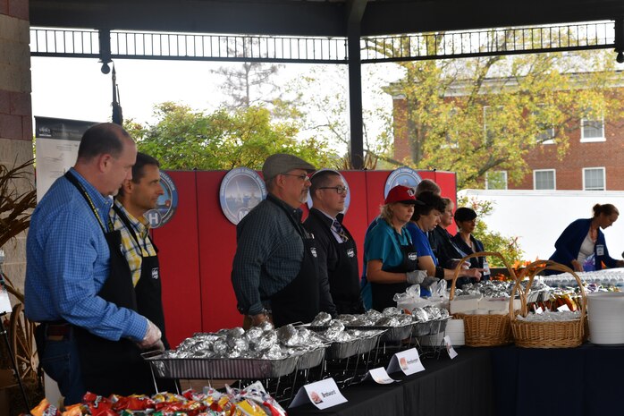 IMAGE: DAHLGREN, Va. (Oct. 30, 2019) – Naval Surface Warfare Center Dahlgren Division leadership prepares to serve employees lunch during the command picnic. (U.S. Navy photo/Released)