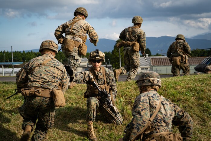U.S. Marine Staff Sgt. Thomas R. Sterett takes accountability of Marines boarding U.S. Army Sikorsky UH-60 Black Hawks during Black Hawk integration training as part of exercise Fuji Viper 20-1 on Camp Fuji, Japan, Oct. 28, 2019. Fuji Viper is a regularly scheduled training evolution for infantry units assigned to 3rd Marine Division as part of the unit deployment program. The training allows units to maintain their lethality and proficiency in infantry and combined arms tactics. Sterett is assigned to 4th Marine Regiment, 3rd Marine Division, and a native of Town Falls, Idaho.