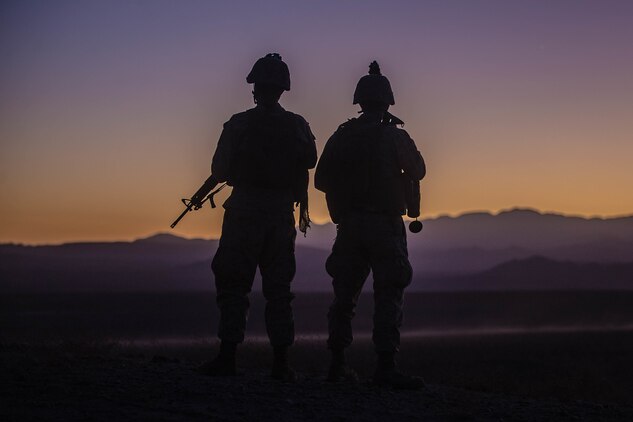 U.S. Marine Corps Staff Sgt. William Huffman, left and Cpl. Stephen Gibbons with Combat Logistics Battalion 8, Combat Logistics Regiment 2, 2nd Marine Logistics Group, prepare to depart an observation point during Integrated Training Exercise 1-20 at Marine Air Ground Combat Center Twentynine Palms, California, Oct. 28, 2019. CLB-8 integrated with 2nd Marine Regiment during ITX as the logistics combat element to provided tactical logistics in the areas of medium and heavy-lift motor transportation beyond the regiment’s organic capabilities.