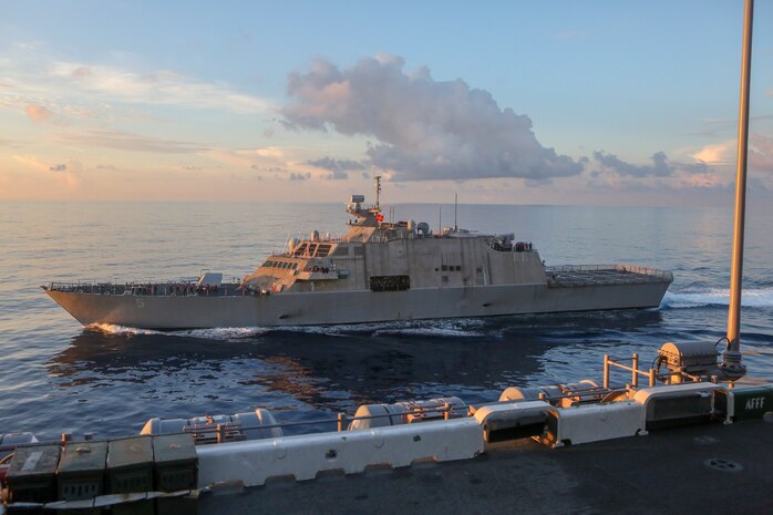 U.S. Navy Sailors with Amphibious Squadron 8 aboard the amphibious assault ship USS Bataan conduct a fueling at sea with the littoral combat ship USS Milwaukee during Composite Training Unit Exercise  in the Atlantic Ocean Oct. 29, 2019. Bataan is underway conducting a COMPTUEX with the Bataan Amphibious Ready Group and 26th MEU.