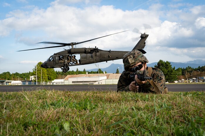 U.S. Marine Lance Cpl. Dakota Gosa provides security during Black Hawk integration training as part of exercise Fuji Viper 20-1 on Camp Fuji, Japan, Oct. 28, 2019. Fuji Viper is a regularly scheduled training evolution for infantry units assigned to 3rd Marine Division as part of the unit deployment program. The training allows units to maintain their lethality and proficiency in infantry and combined arms tactics. Gosa is assigned 4th Marine Regiment, 3rd Marine Division, and a native of Greenville, S.C.