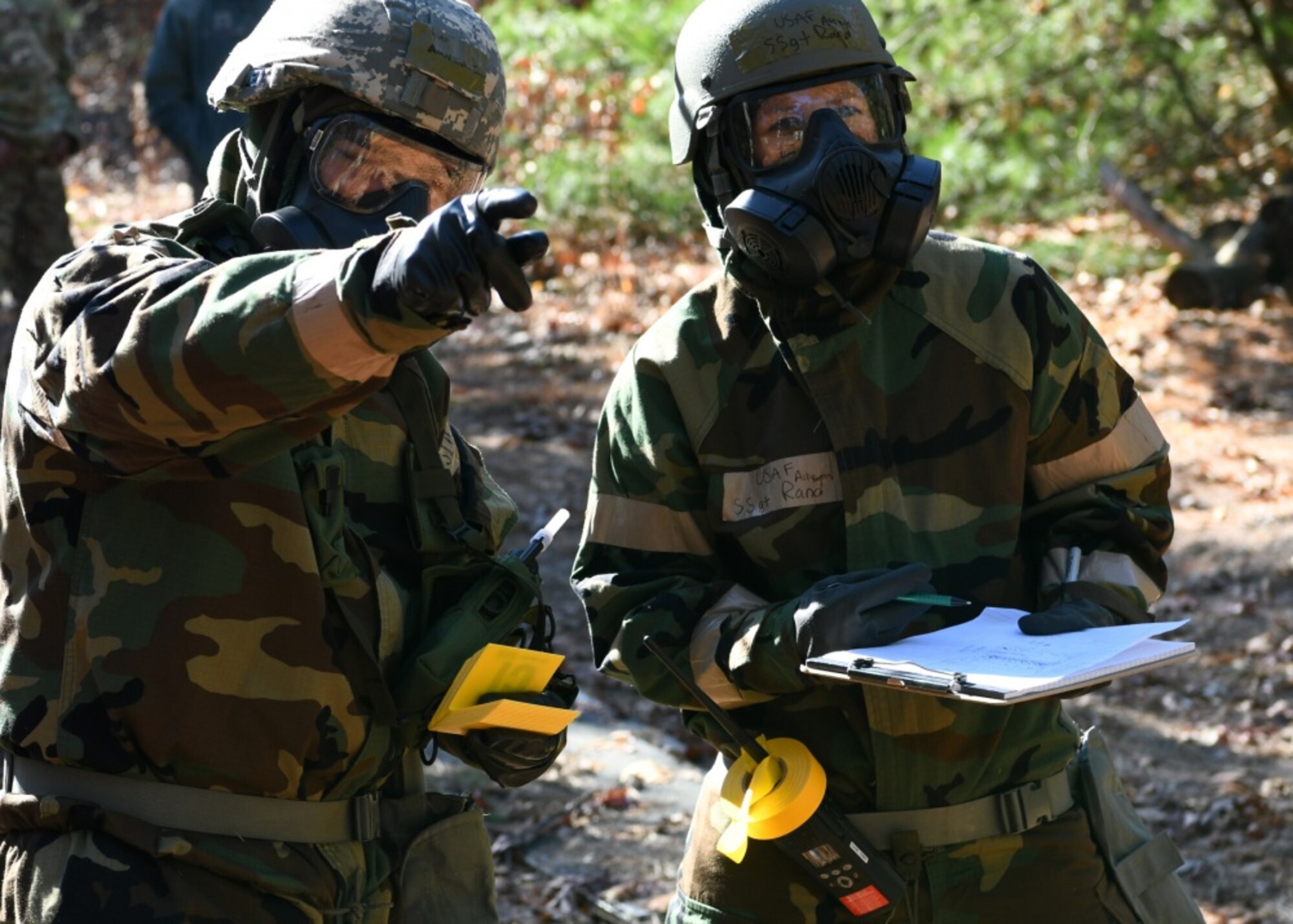 U.S. Air Force Airman Joshua Towse and Staff Sgt. Allison Rand, both emergency  management specialist assigned to the 104th Fighter Wing, Massachusetts Air National Guard, simulate Level A for a biological Ricin lab during a four-day readiness exercise Nov. 1, 2019, at Barnes Air National Guard Base, Mass. (U.S. Air National Guard photo by Airman 1st Class Sara Kolinski)
