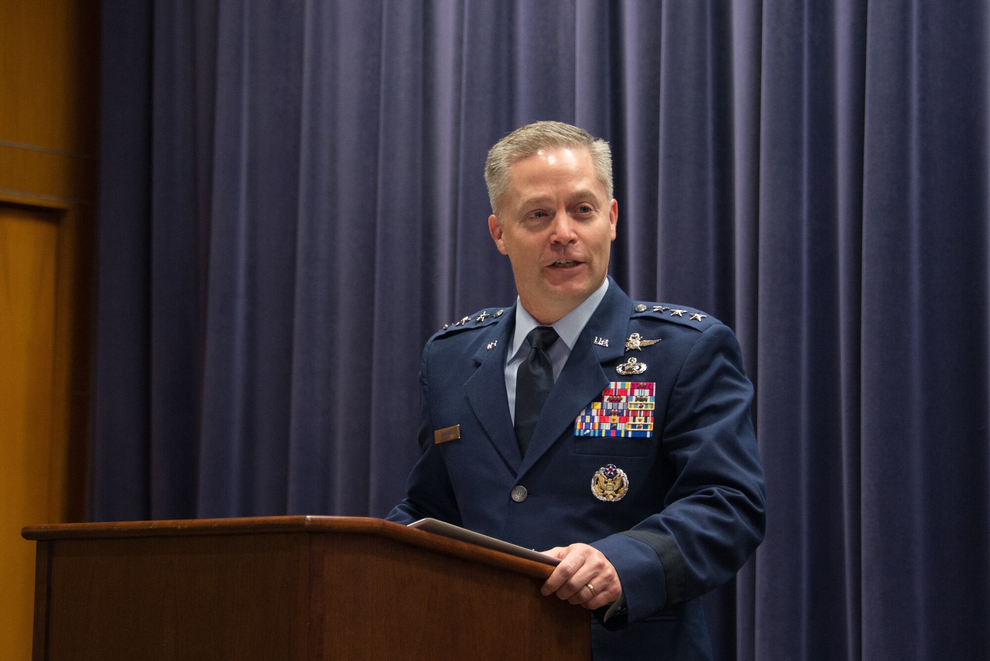 Lt. Gen Timothy Haugh, Sixteenth Air Force commander, speaks during the 557th Weather Wing’s Sixteenth Air Force reassignment ceremony at the wing’s headquarters building, Offutt Air Force Base, Nebraska, Oct. 29, 2019. Sixteenth Air Force is headquartered at Joint Base San Antonio-Lackland, Texas, and is the Air Force’s first information warfare NAF. (U.S. Air Force photo by Paul Shirk)