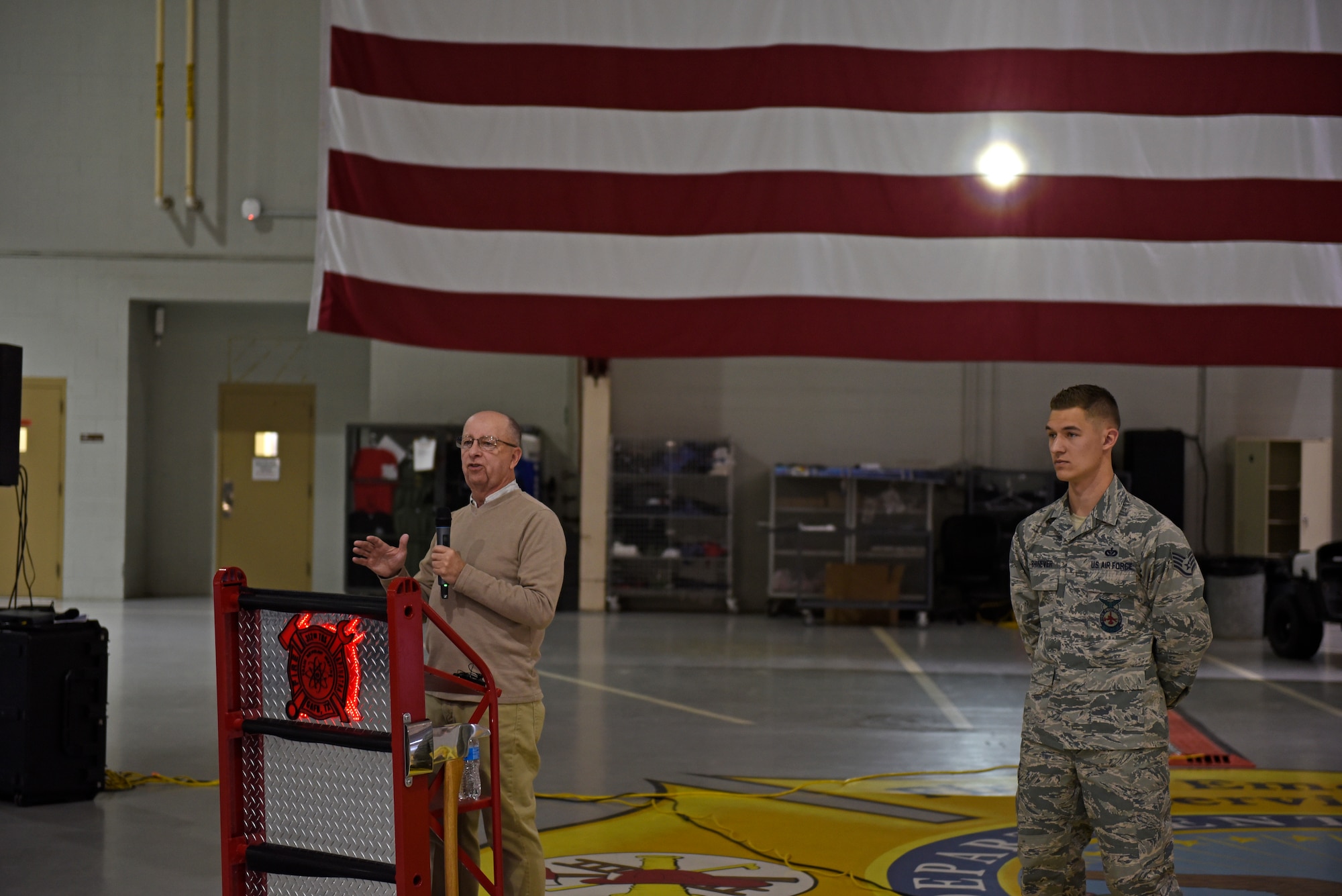 Retired U.S. Air Force Chief Master Sgt. Ronald Graham speaks during the Retiree Appreciation Day event at the Louis F. Garland Department of Defense High Bay, Goodfellow Air Force Base, Texas, Nov. 1, 2019. Graham served 30 years in the Air Force as a signals intelligence analyst. (U.S. Air Force photo by Airman 1st Class Zachary Chapman/Released)